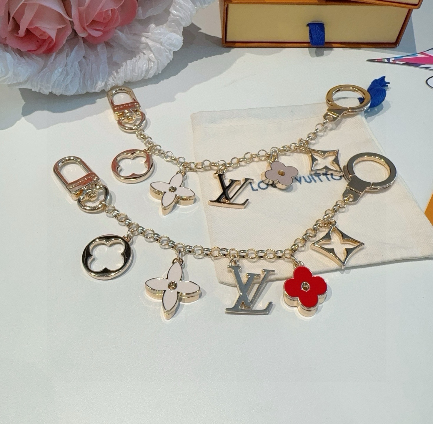 Louis Vuitton Enamel Clover LV Logo Four-Point Star Long Chain Keychain & Bag Charm - KAIROO