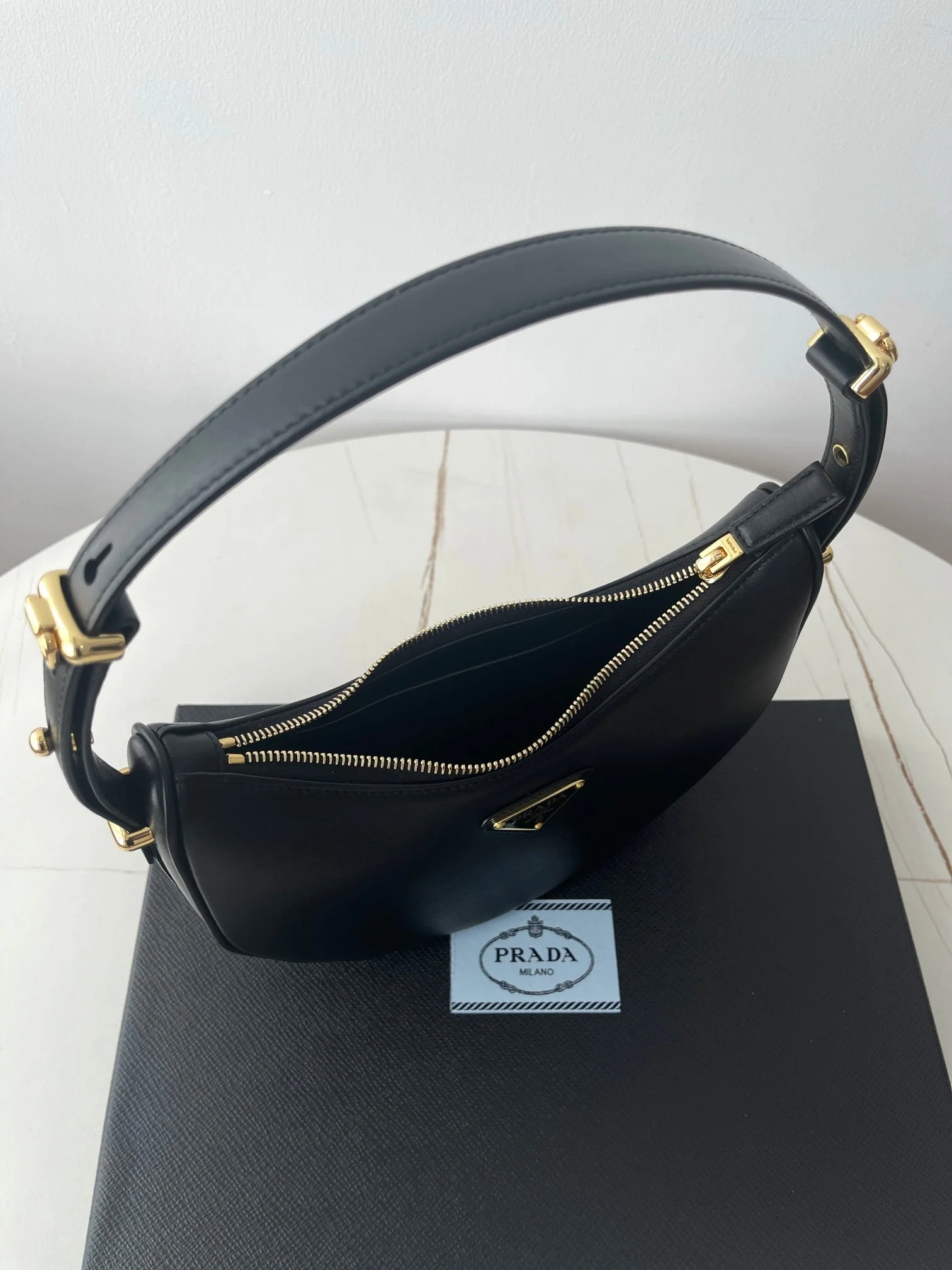 Prada ARQUÉ 22 SHOULDER BAG IN BLACK LEATHER