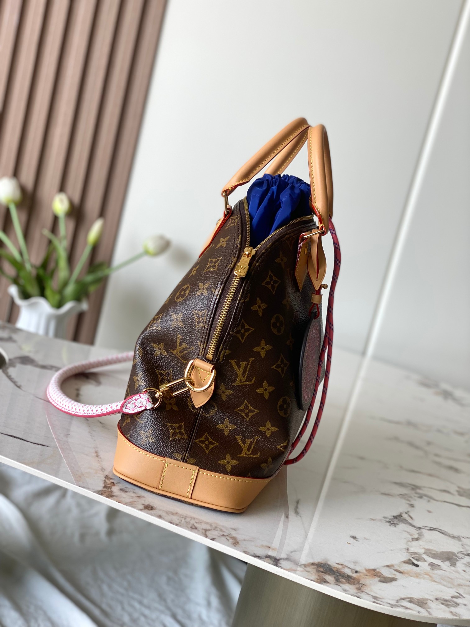 Louis Vuitton Alma Soft Medium Handbag