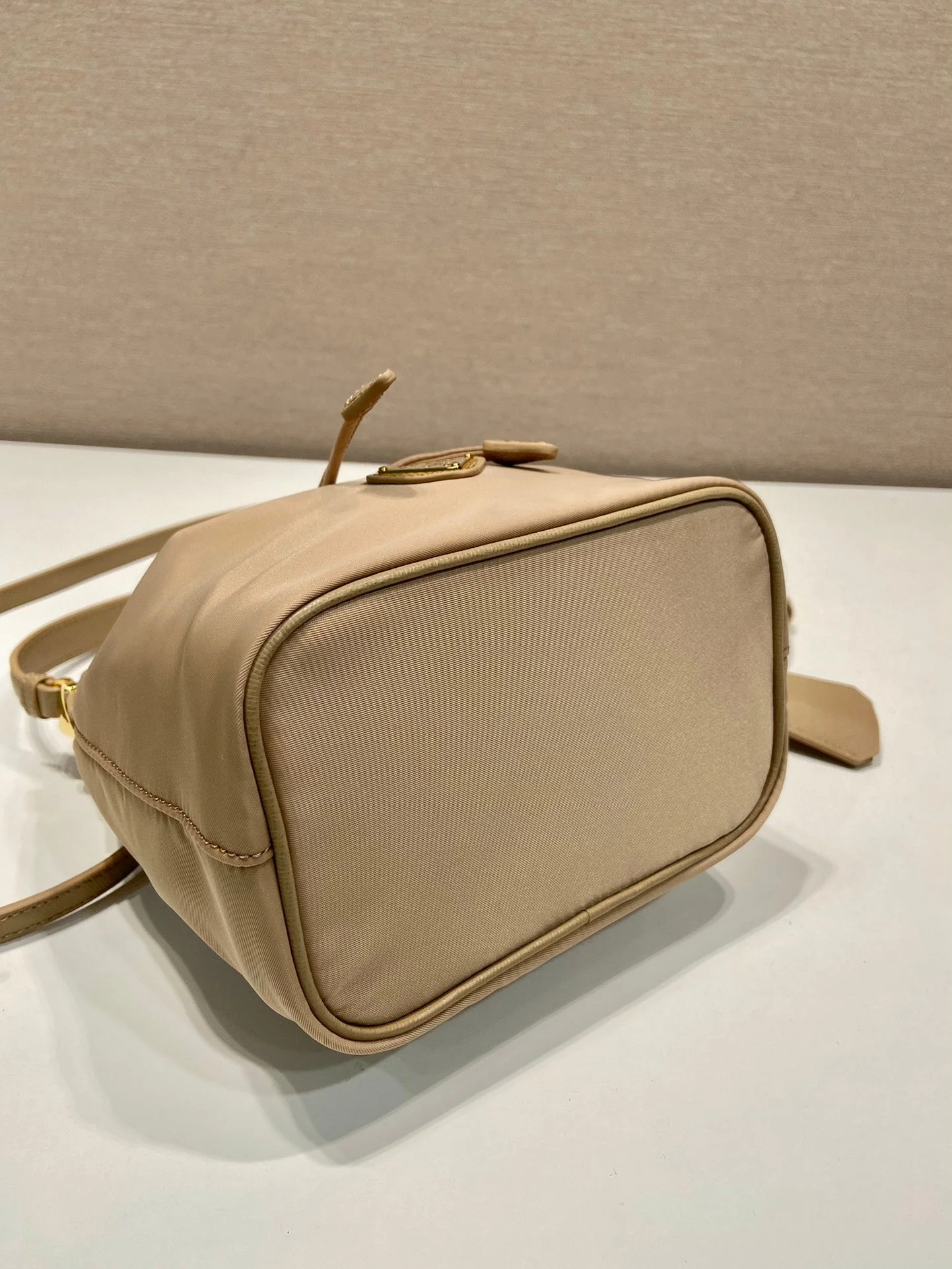 Prada BUCKET BAG 19 IN BEIGE RE-NYLON AND SAFFIANO LEATHER HANDLE