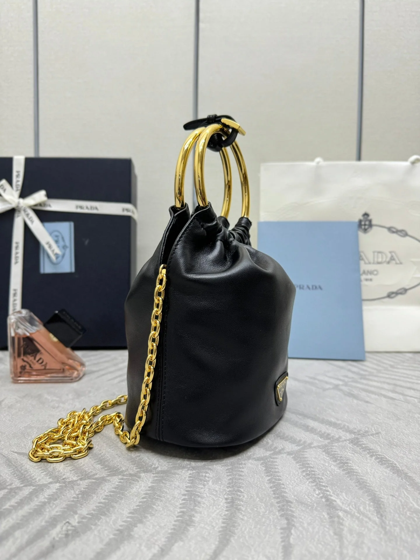 Prada MINI BUCKET BAG 19 IN BLACK SOFT NAPPA LAMBSKIN GOLD HARDWARE