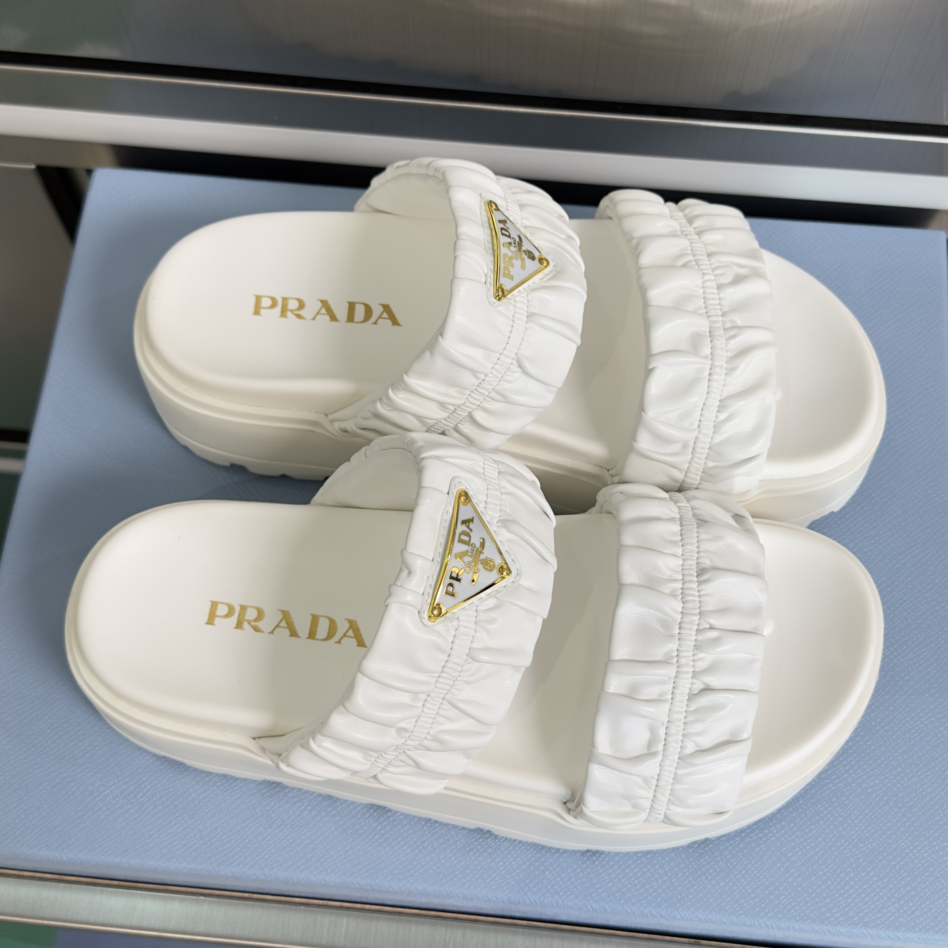 Prada Matelassé nappa leather flatform slides