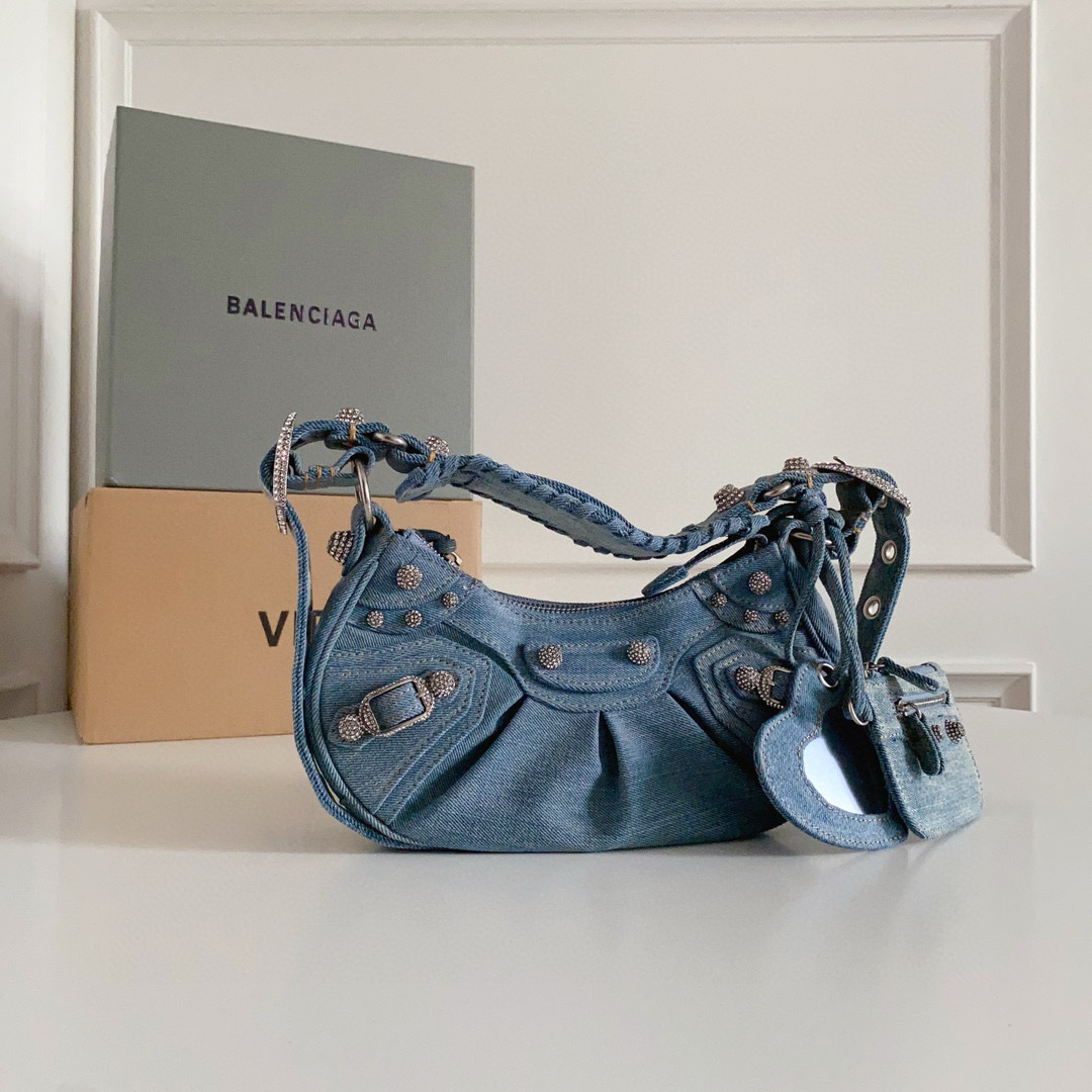 𝐁alenciaga Le Cagole XS Shoulder Bag in Blue washed Denim