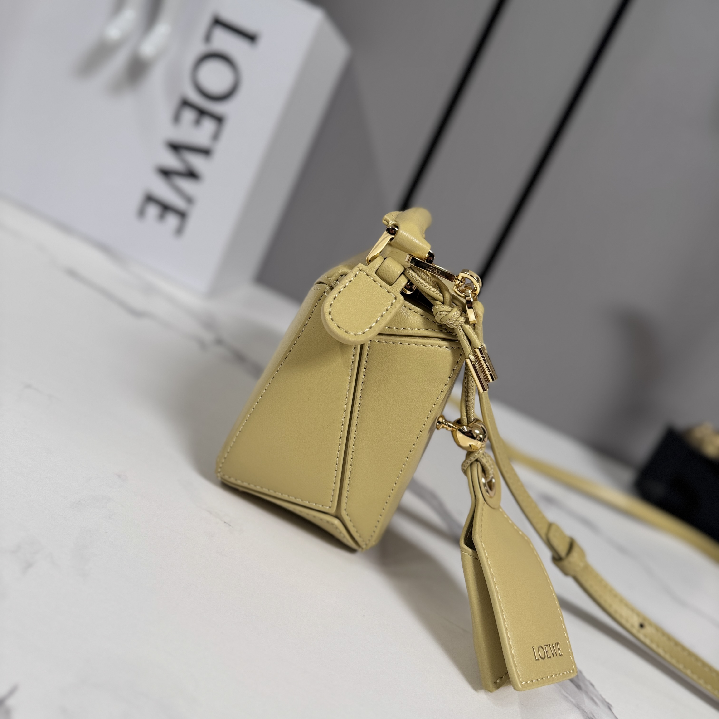 Loewe Mini Featherlight Puzzle bag in nappa lambskin- Butter Yellow