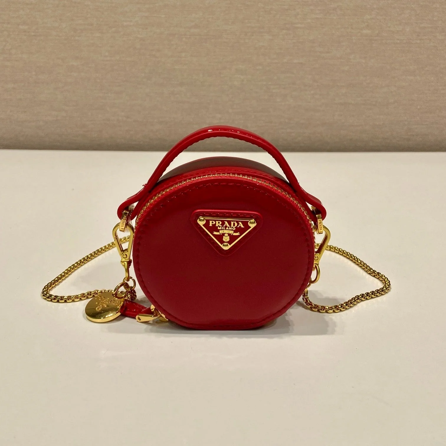 Prada MINI ROUND BAG 8 IN RED GLOSSY CALFSKIN GOLD HARDWARE
