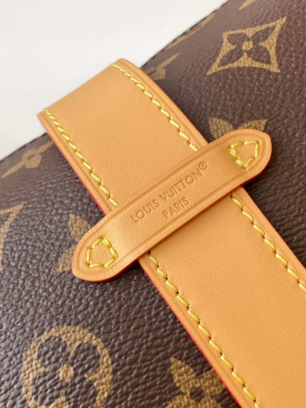 Louis Vuitton Pochette Mia Handbag