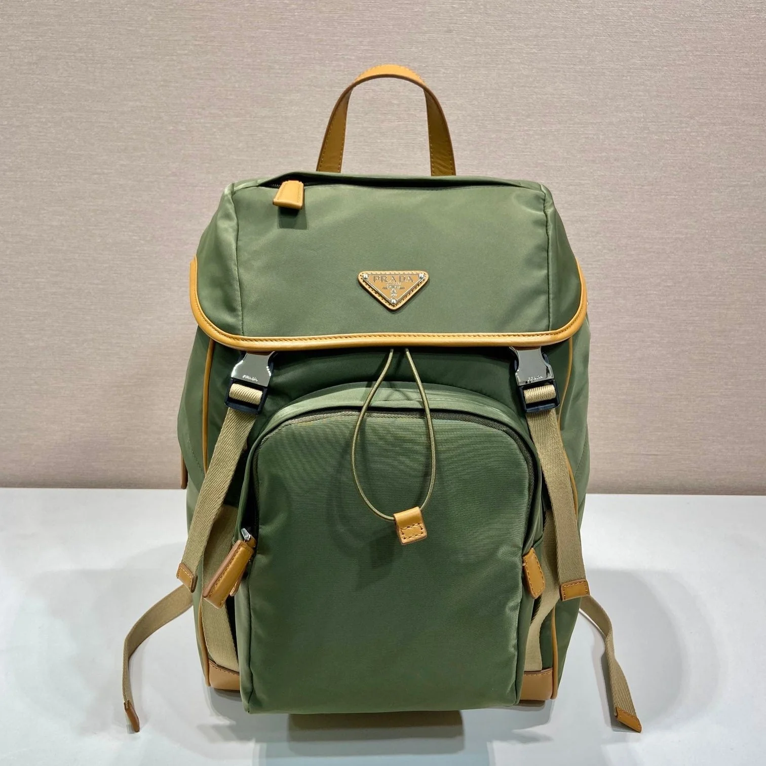 Prada BACKPACK 45 IN SEAWEED GREEN RE-NYLON AND BROWN CALFSKIN TRIM