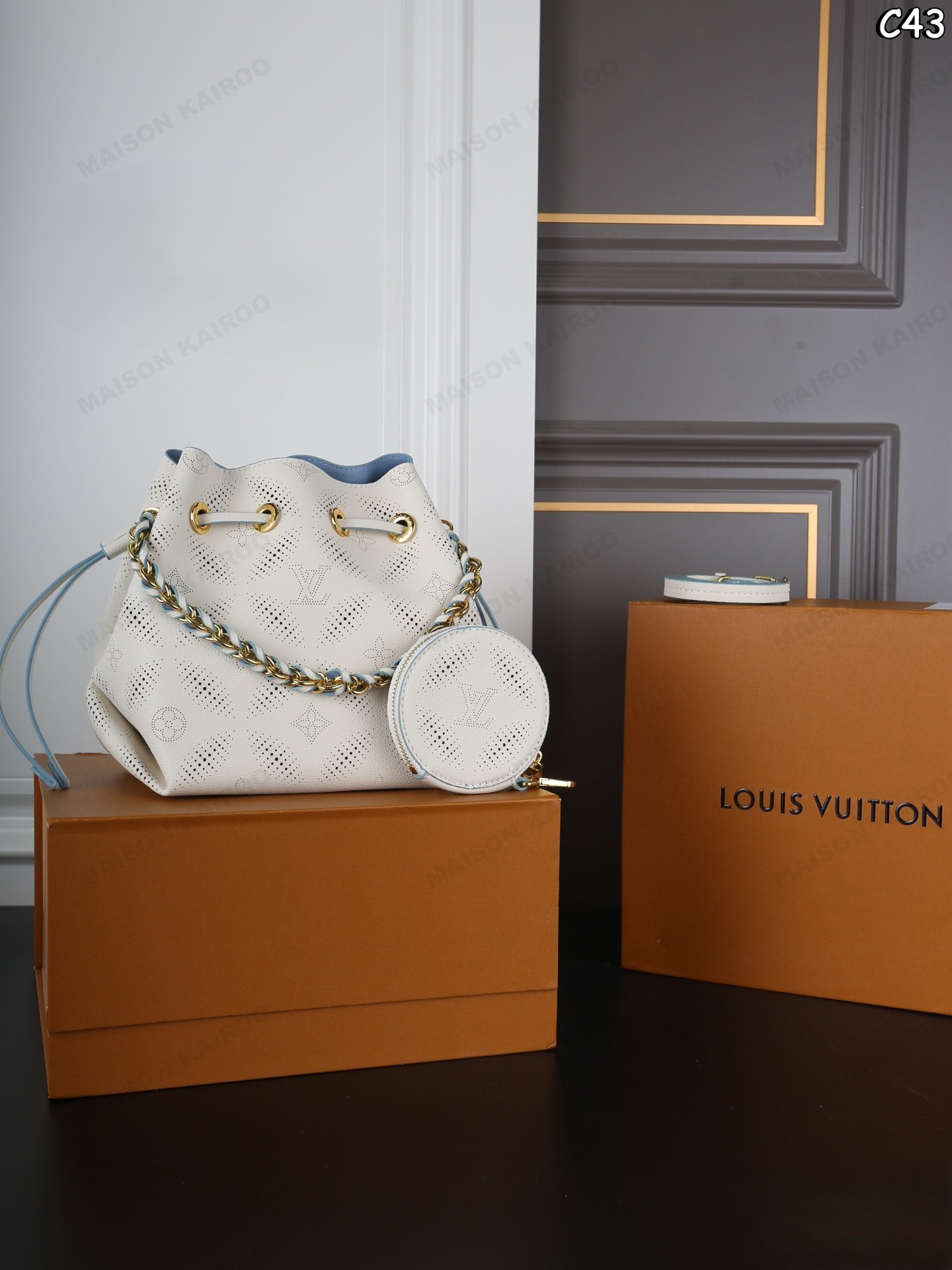 Louis Vuitton LV Mahina Bella Off White Round Perforated Monogram Leather Drawstring Bucket Shoulder Bag - KAIROO