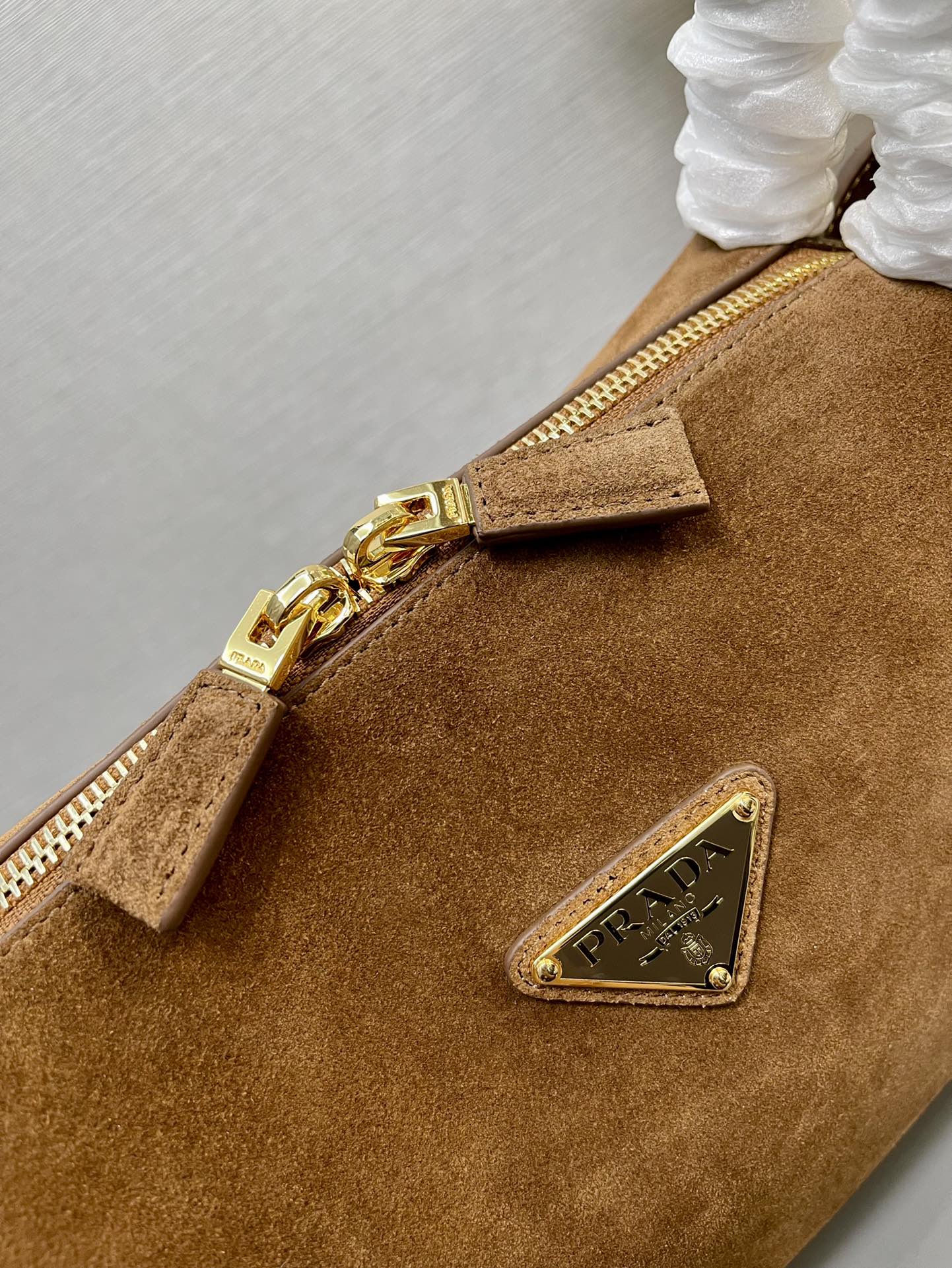 Prada SHOULDER BAG 28 IN TAWNY BROWN SUEDE GOLD LOGO