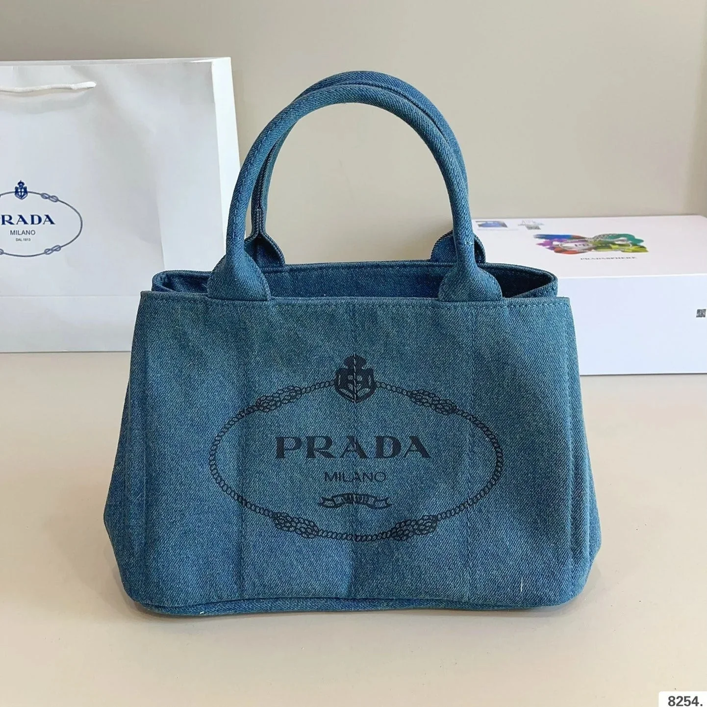 Prada CANAPA TOTE BAG 29 IN BISMARK BLUE DENIM