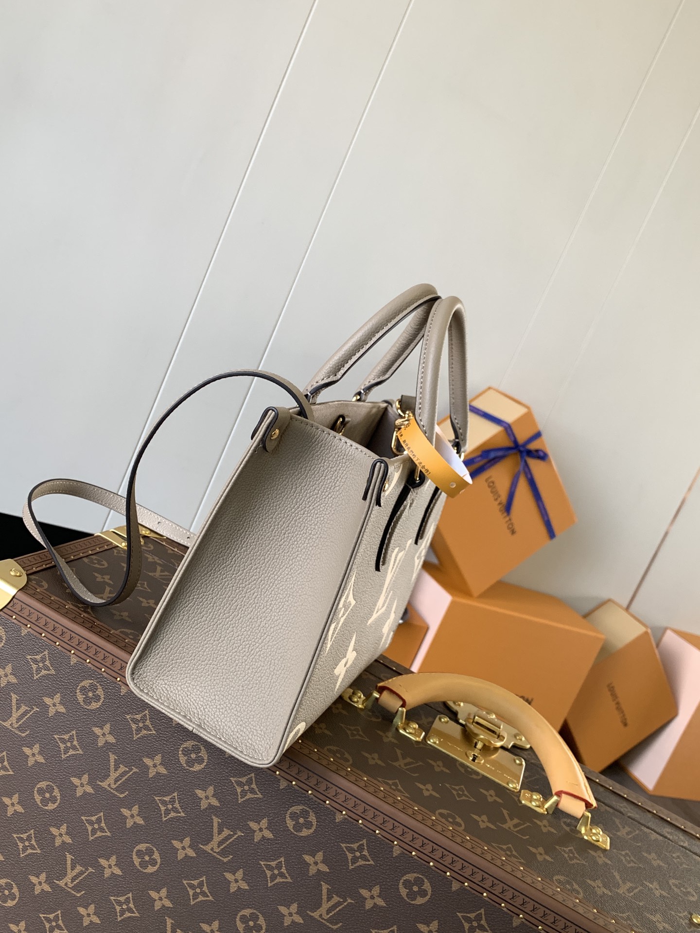 M45779 LV OnTheGo PM Bag Tote In Tourterelle  Bicolor Monogram Empreinte Leather