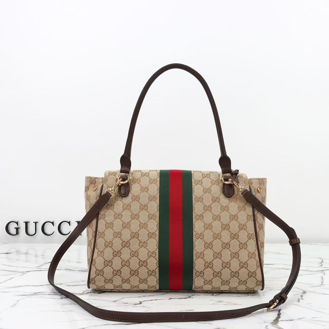GUCCI Paparazzo medium top handle bag