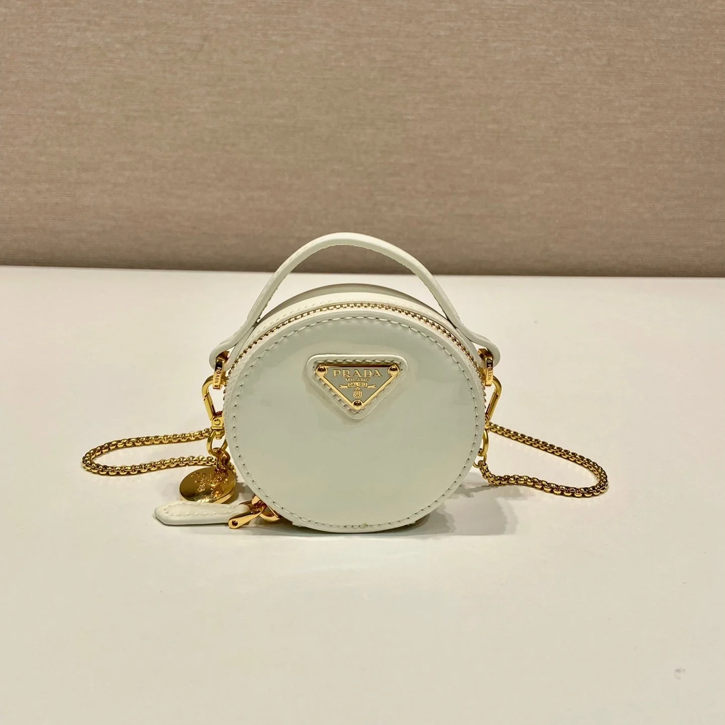 Prada MINI ROUND BAG 8 IN WHITE GLOSSY CALFSKIN GOLD HARDWARE