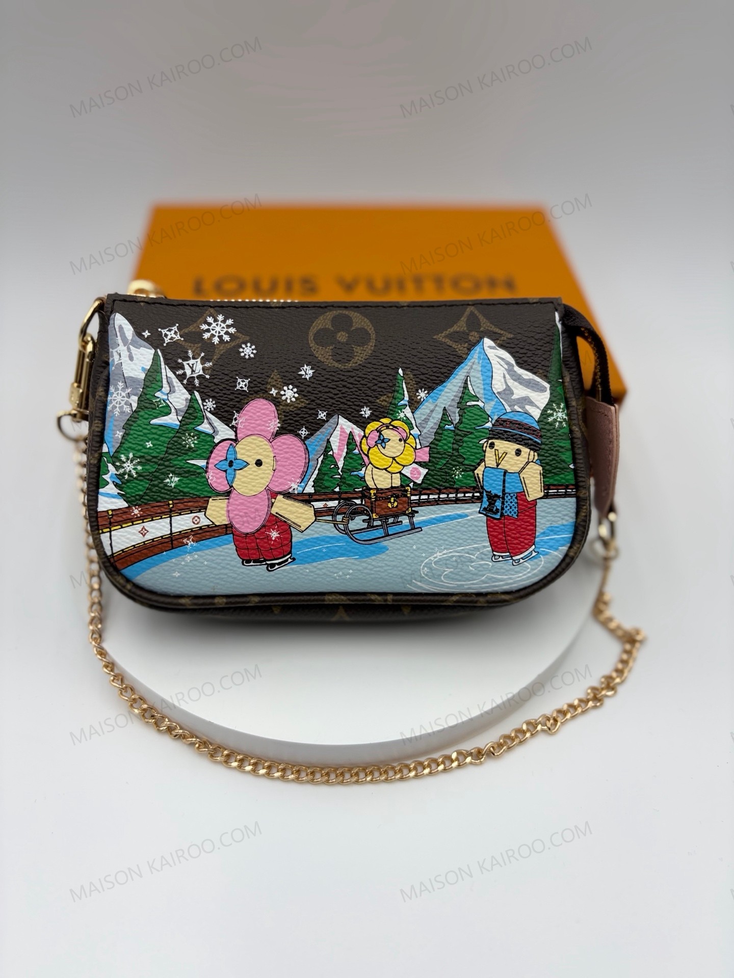 Louis Vuitton LV Mini Pochette Accessoires Vivienne Winter Snow Ice Skating Brown Monogram Chain Pouch Bag - KAIROO