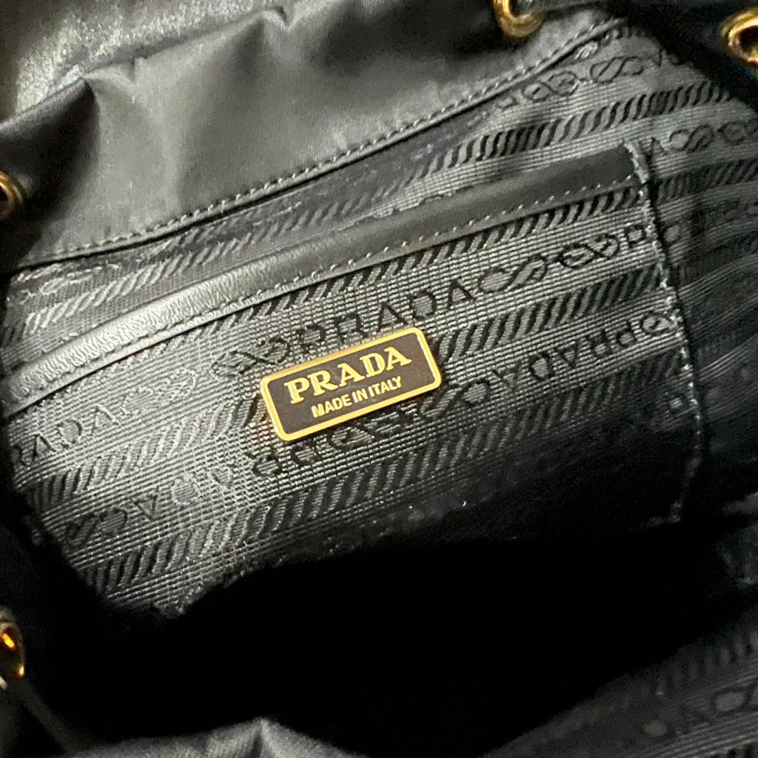 Prada BACKPACK 25 IN BLACK RE-NYLON AND GLOSSY CALFSKIN GOLD HARDWARE