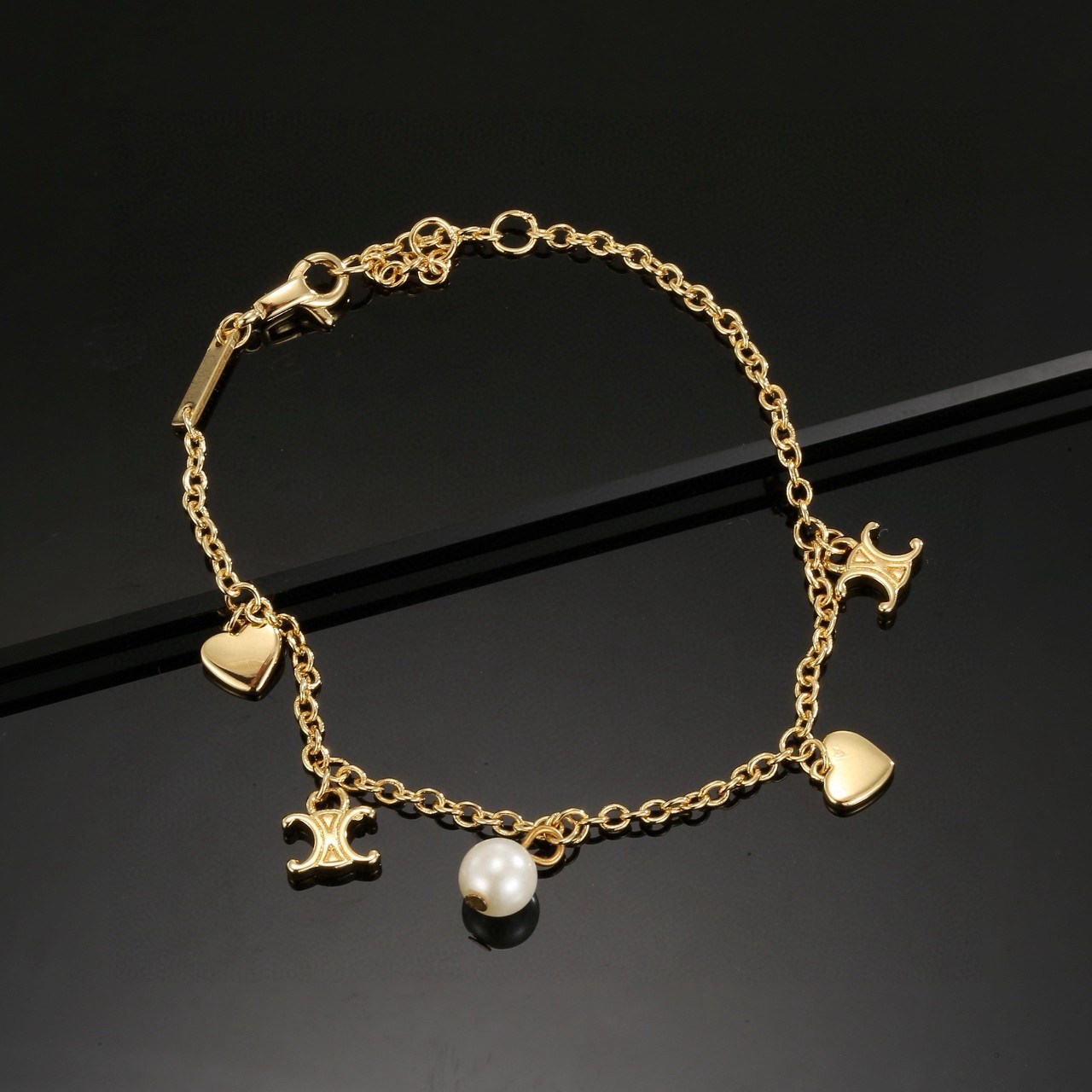 Celine Gold Finish Triomphe Logo with Heart and Pearl Charms Multi-element Bracelet - KAIROO