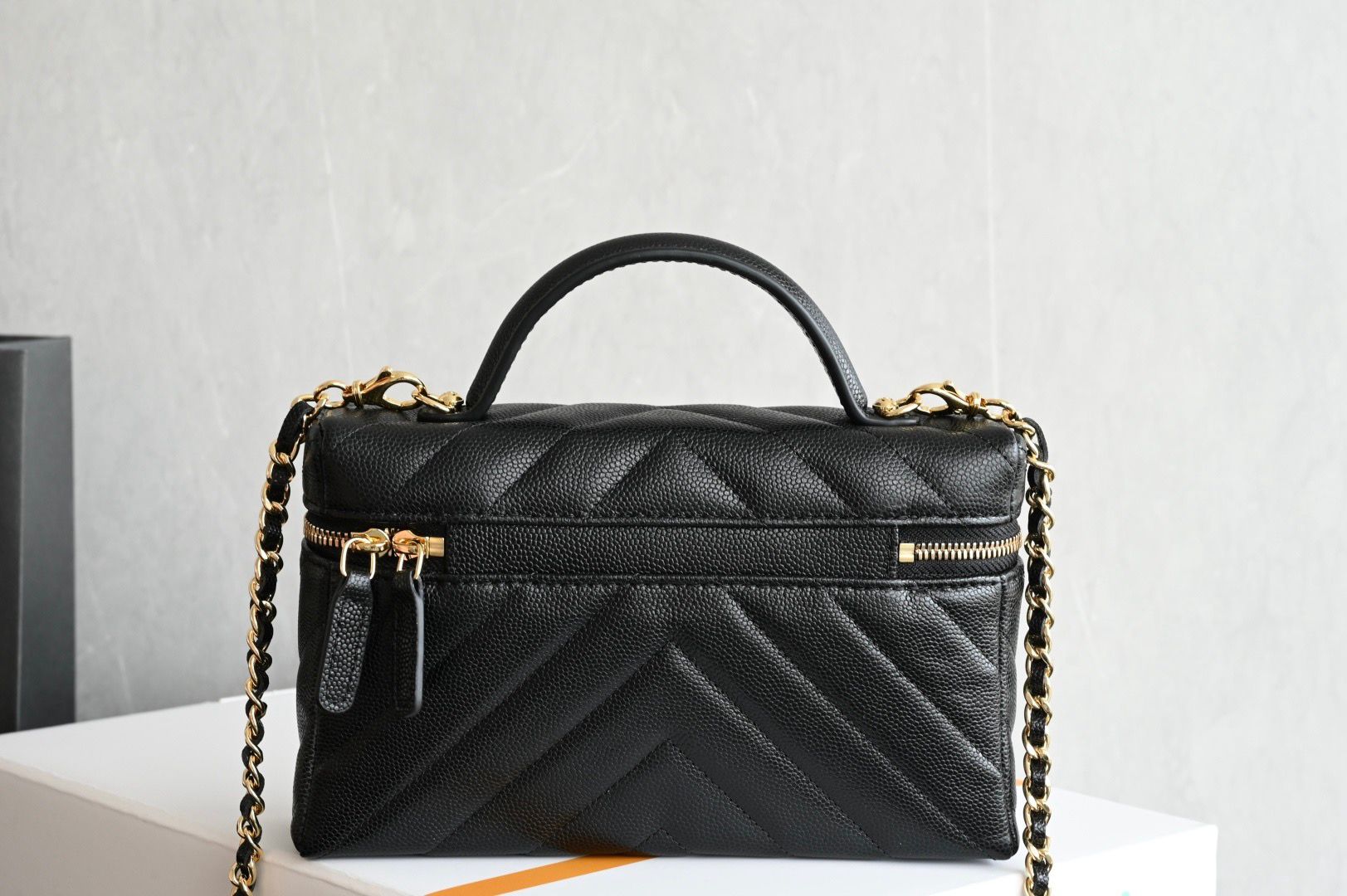 Chanel V-pattern makeup bag