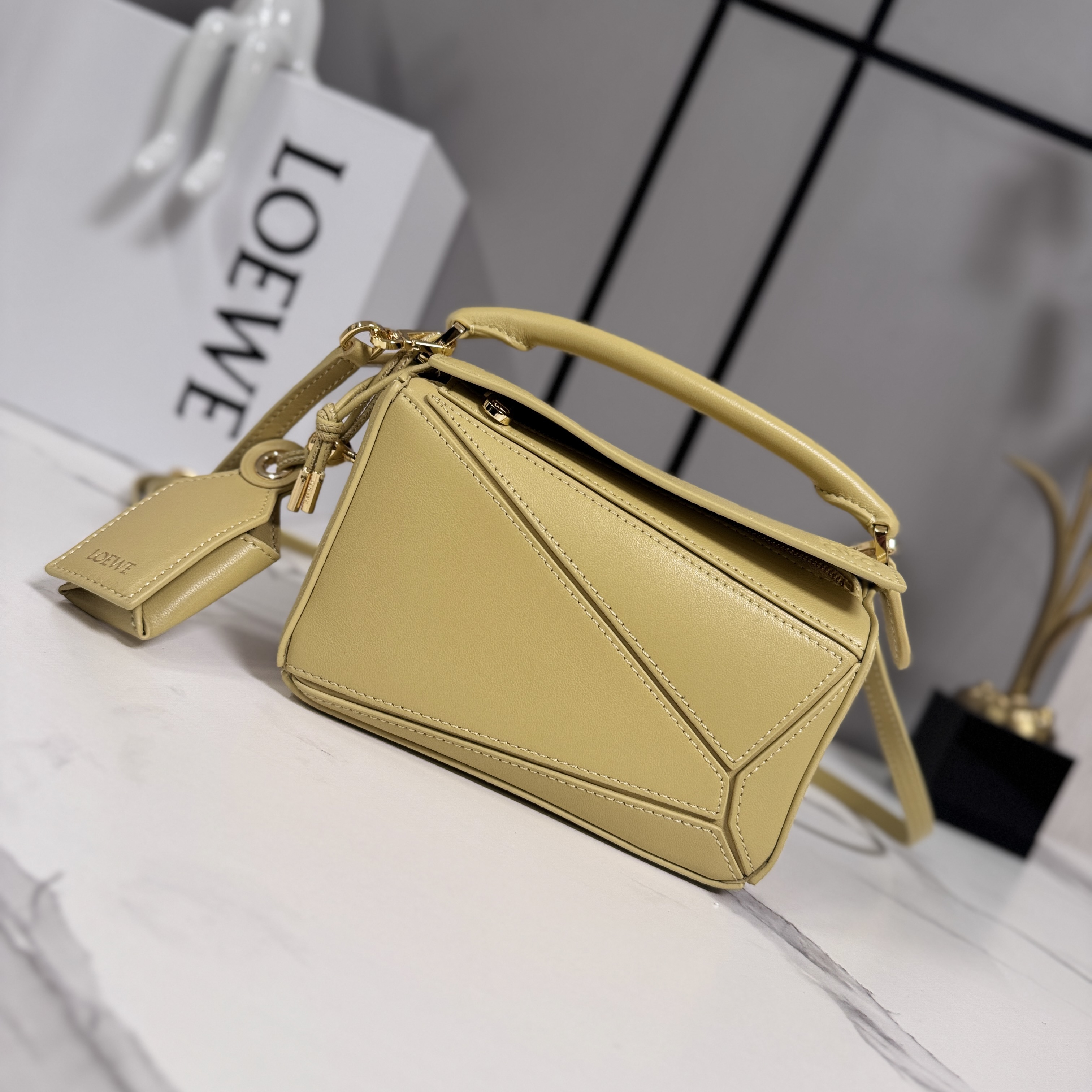 Loewe Mini Featherlight Puzzle bag in nappa lambskin- Butter Yellow
