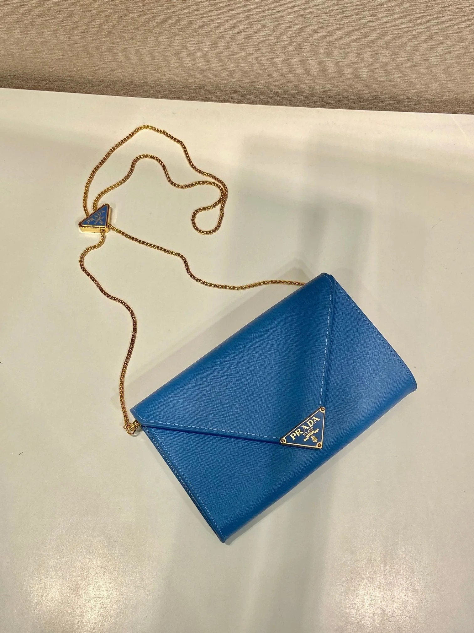 Prada PRA Cross pattern envelope bag blue leather 341158