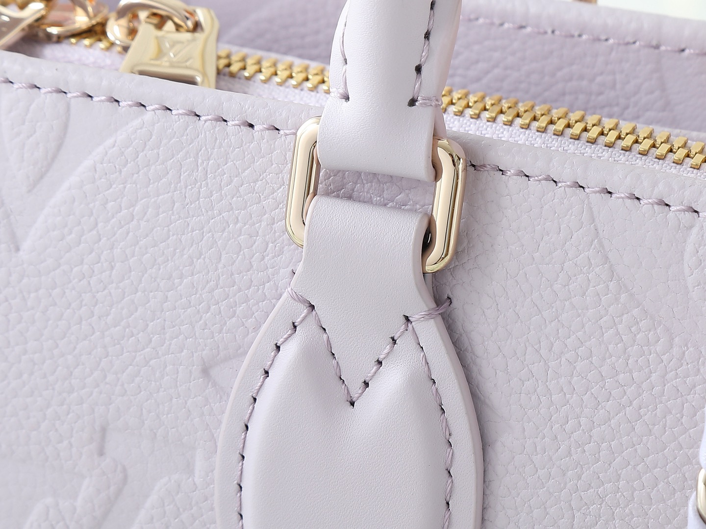 Louis Vuitton LV TM ONTHEGO EAST WEST CHAIN ​​White