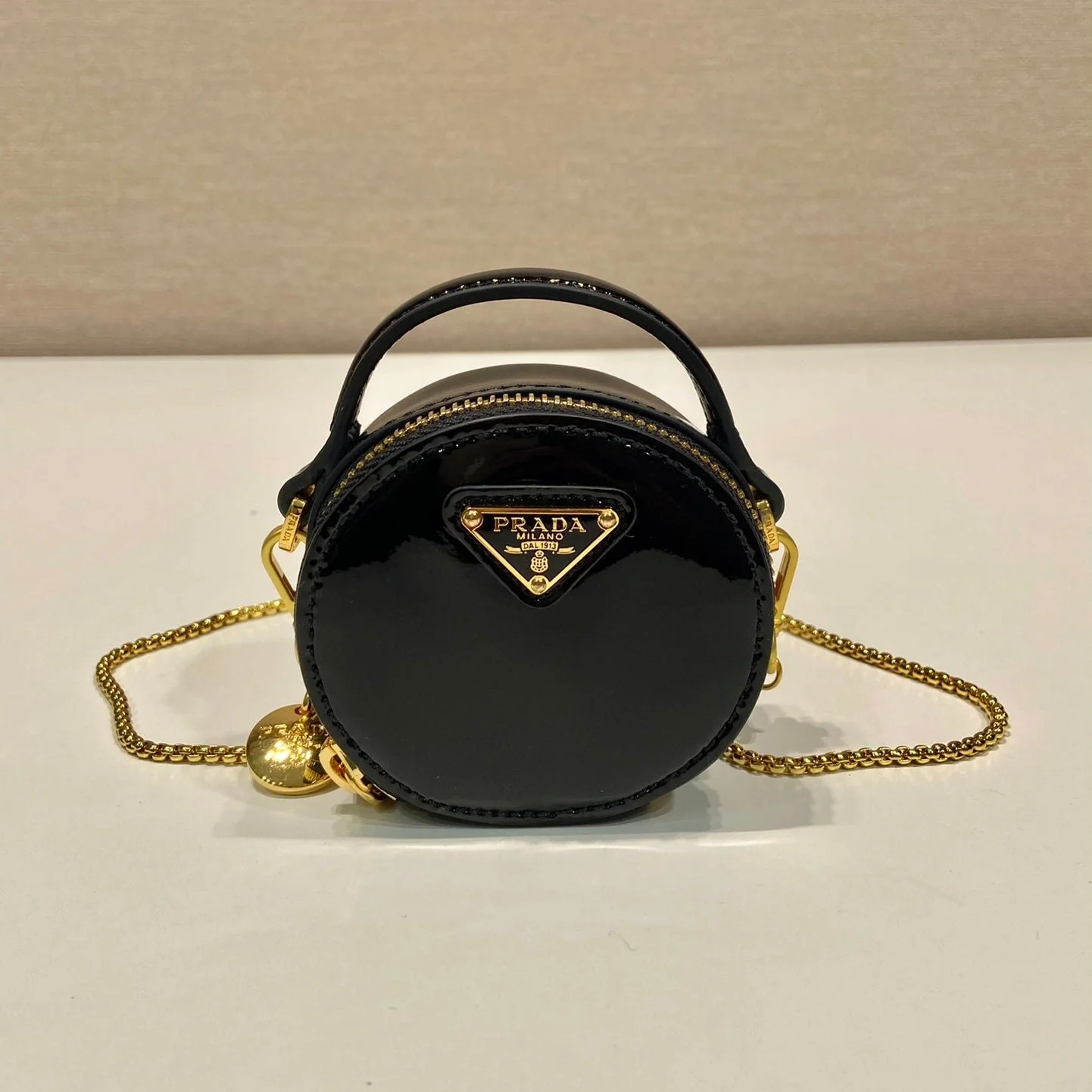 Prada MINI ROUND BAG 8 IN BLACK GLOSSY CALFSKIN GOLD HARDWARE