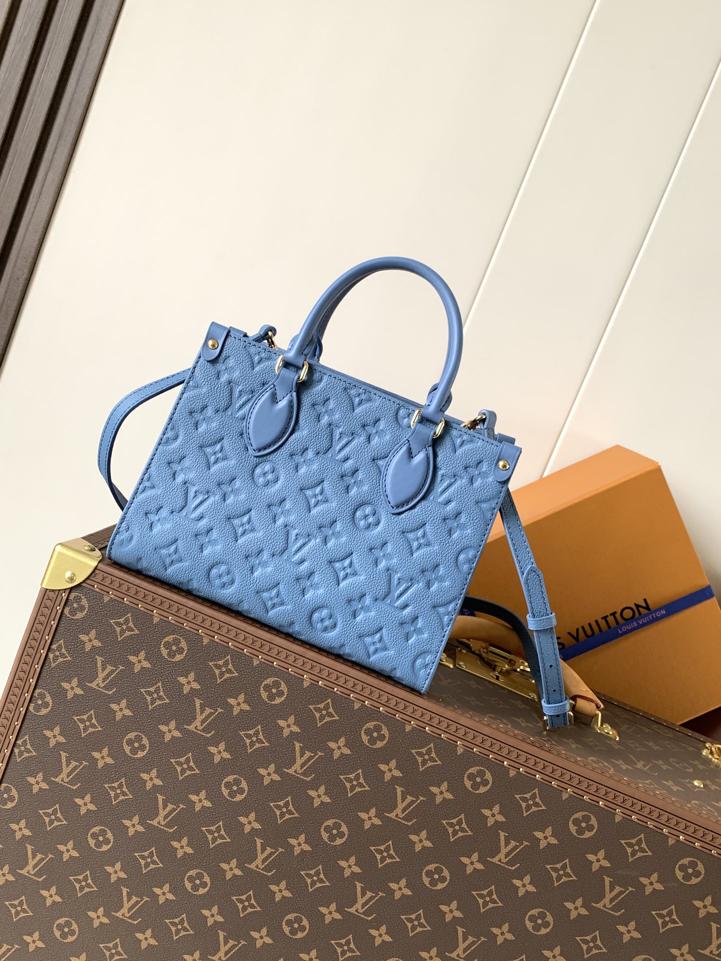 M28181 LV OnTheGo PM Bag in Blue Jean Monogram Empreinte leather