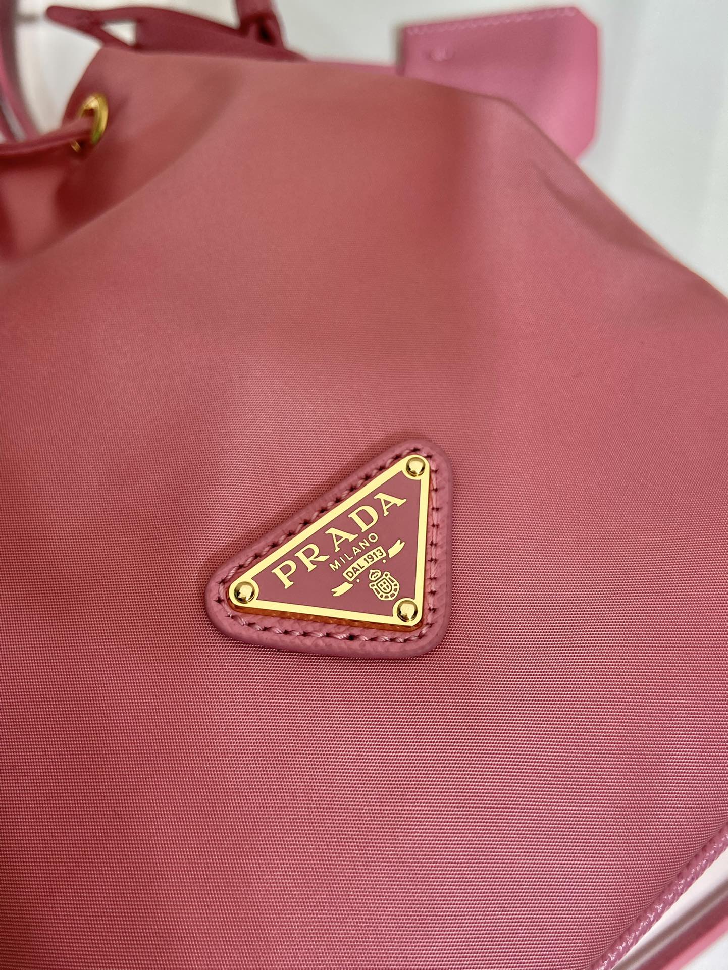 Prada BUCKET BAG 19 IN CANDY PINK RE-NYLON AND SAFFIANO LEATHER HANDLE
