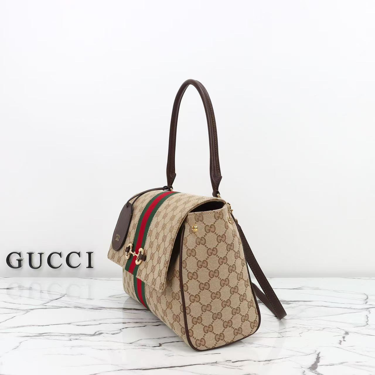 GUCCI Paparazzo medium top handle bag