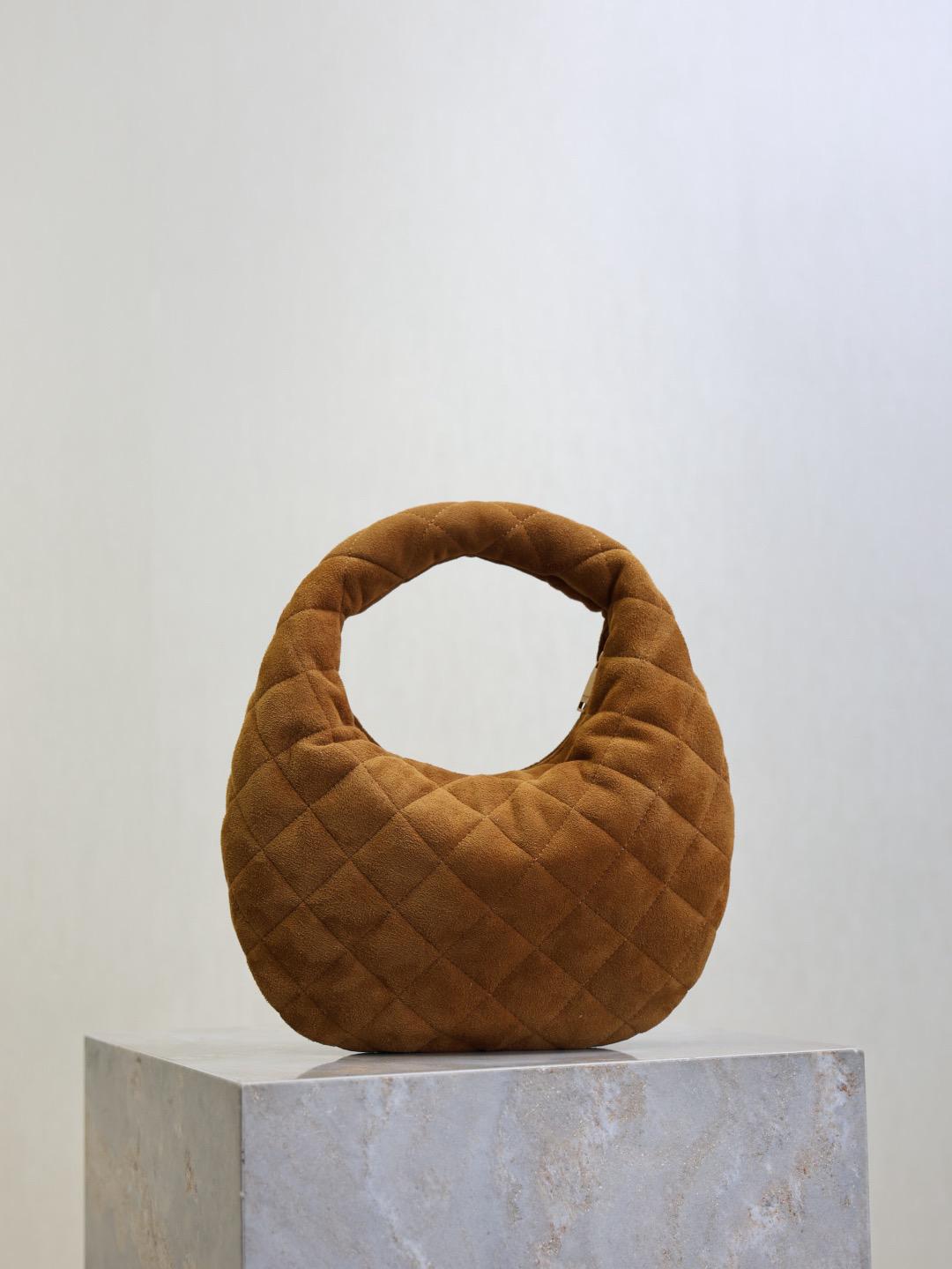 Saint Laurent ysl bags ICARINO in quilted suede in Brown