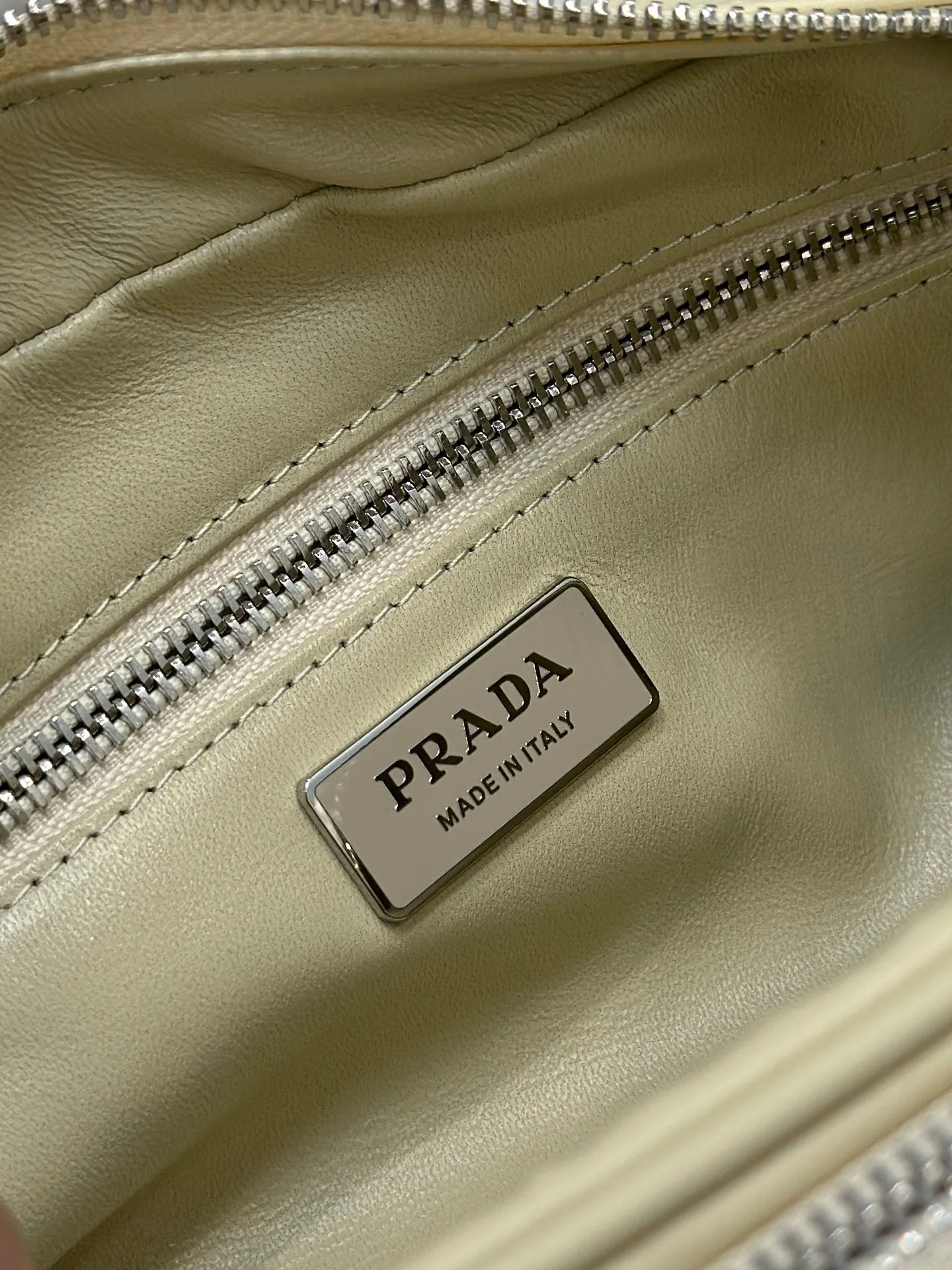 Prada CAMERA BAG 23 IN CREAM WRINKLED LAMBSKIN