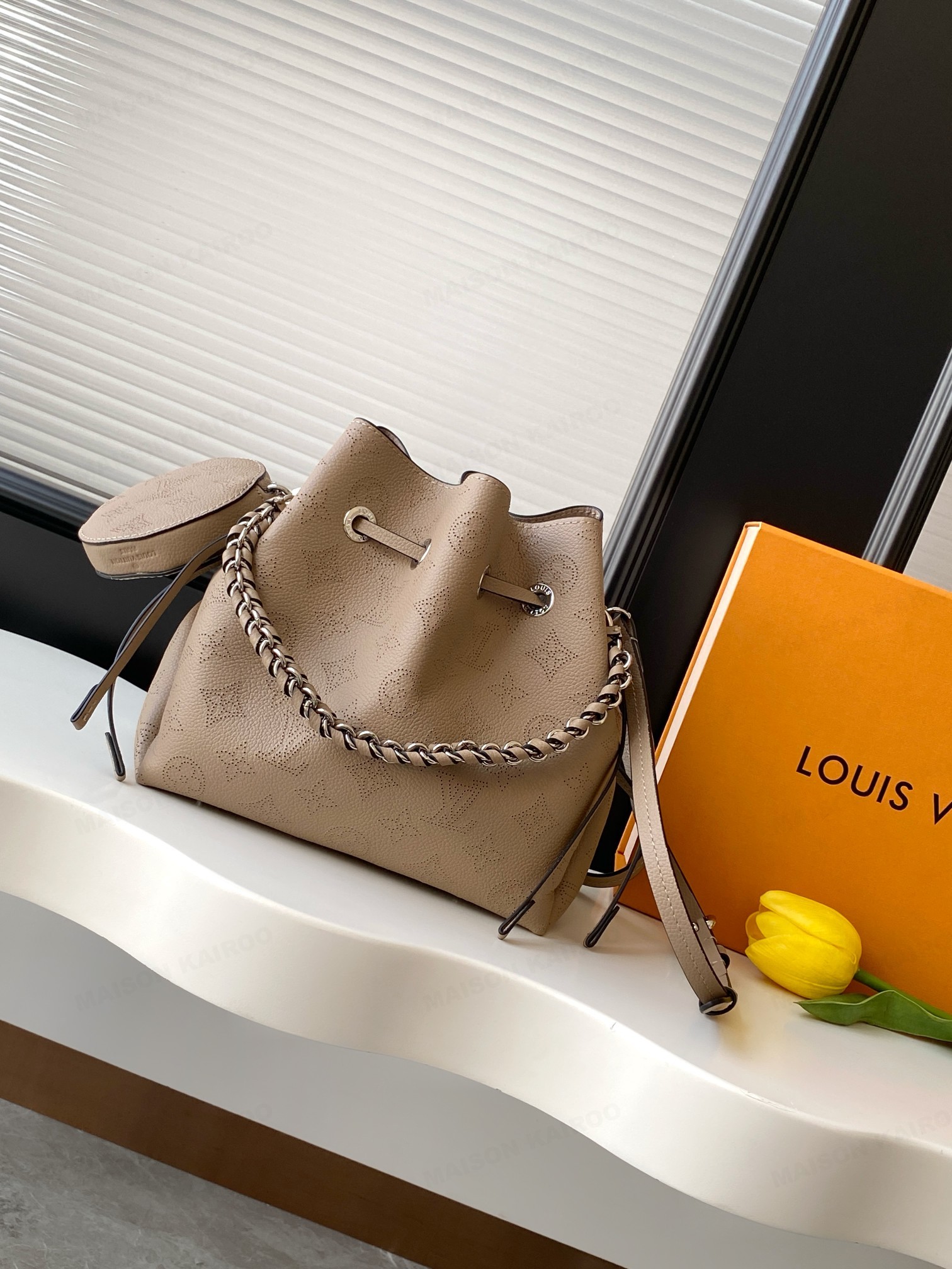 Louis Vuitton LV Mahina Bella Taupe Dense Perforated Monogram Leather Drawstring Bucket Handle Shoulder Bag - KAIROO