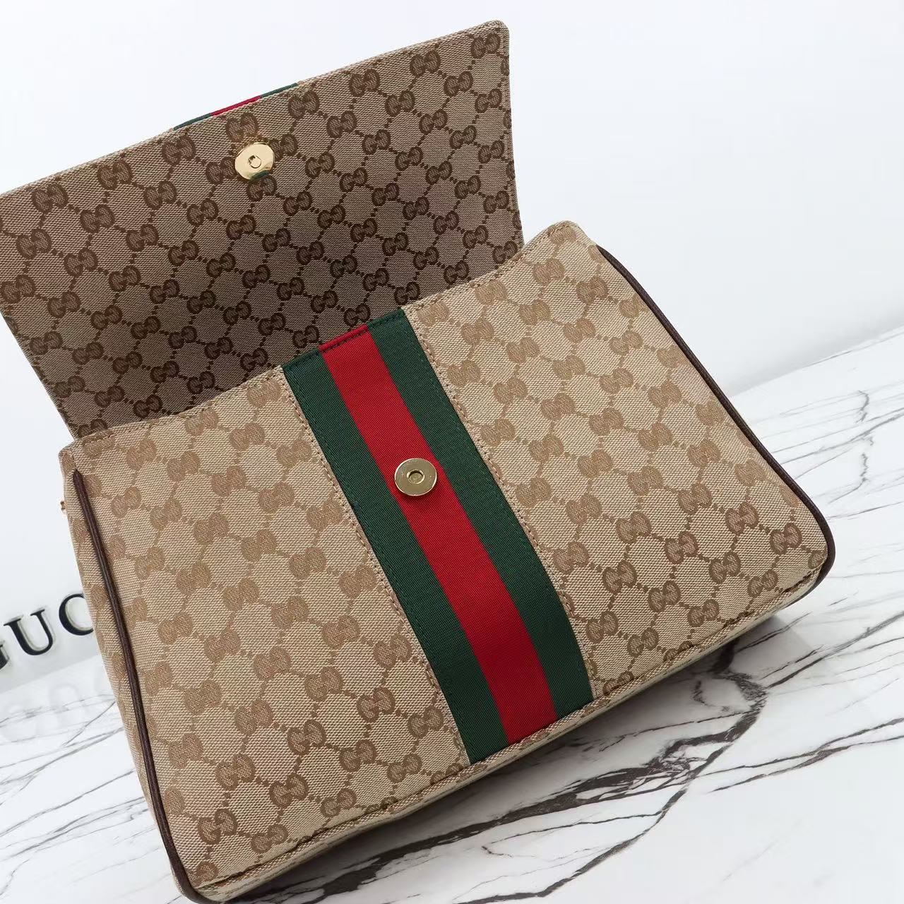GUCCI Paparazzo medium top handle bag