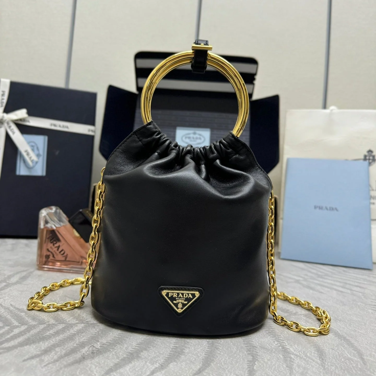 Prada MINI BUCKET BAG 19 IN BLACK SOFT NAPPA LAMBSKIN GOLD HARDWARE