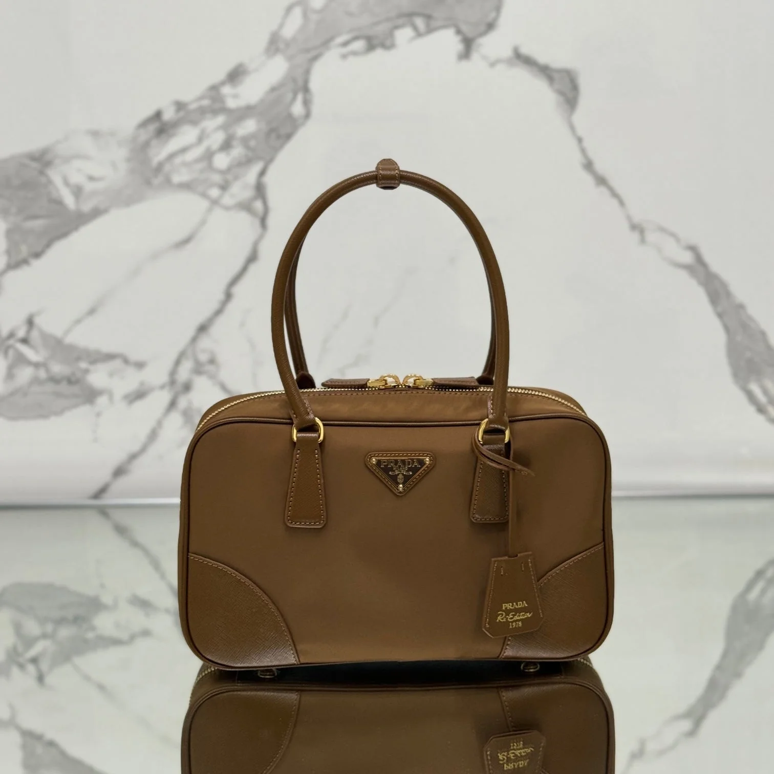 Prada MEDIUM TOP HANDLE BAG 30 IN CHERRY WOOD NYLON AND CALFSKIN TRIM