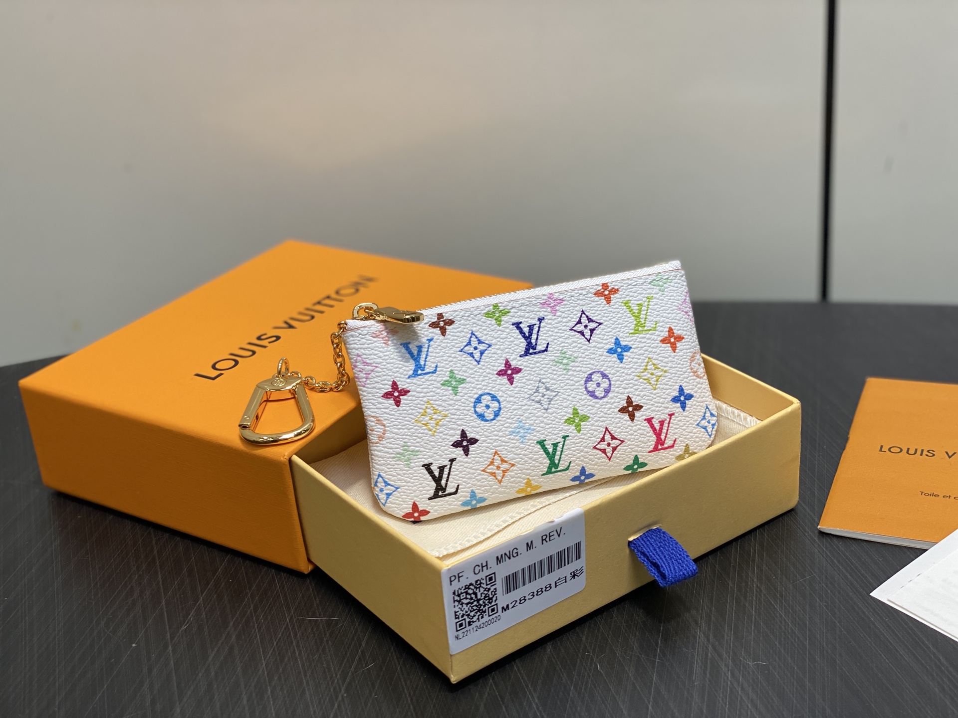 M28388  LV x TM Key Pouch White multicolored canvas