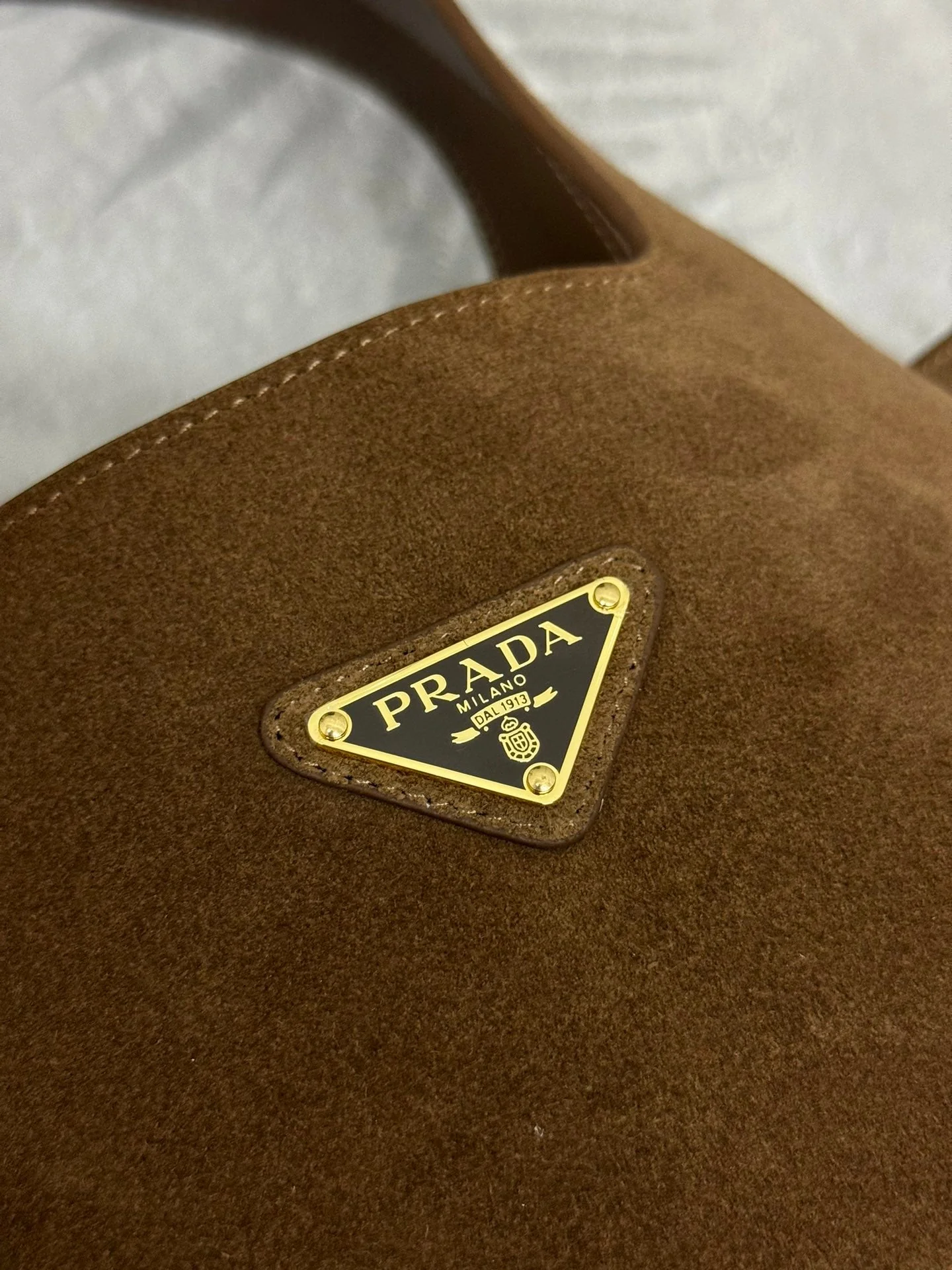 Prada TOTE BAG 25 IN CHERRY WOOD SUEDE GOLD LOGO