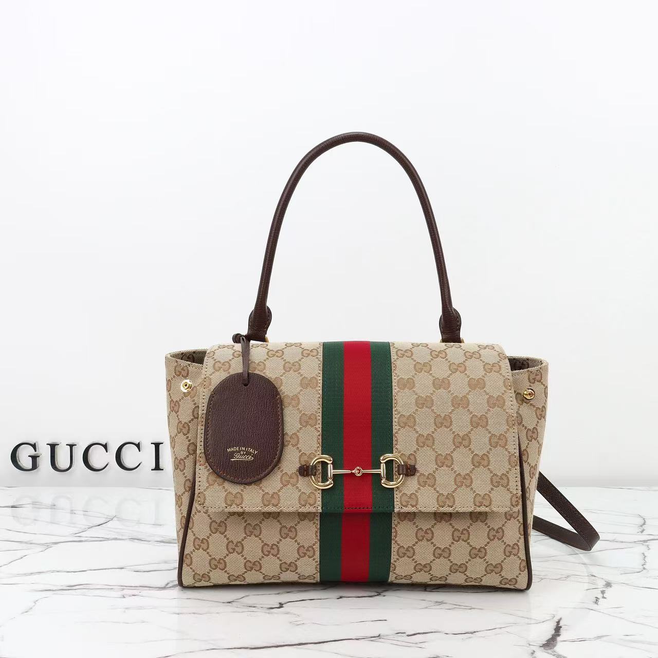 GUCCI Paparazzo medium top handle bag