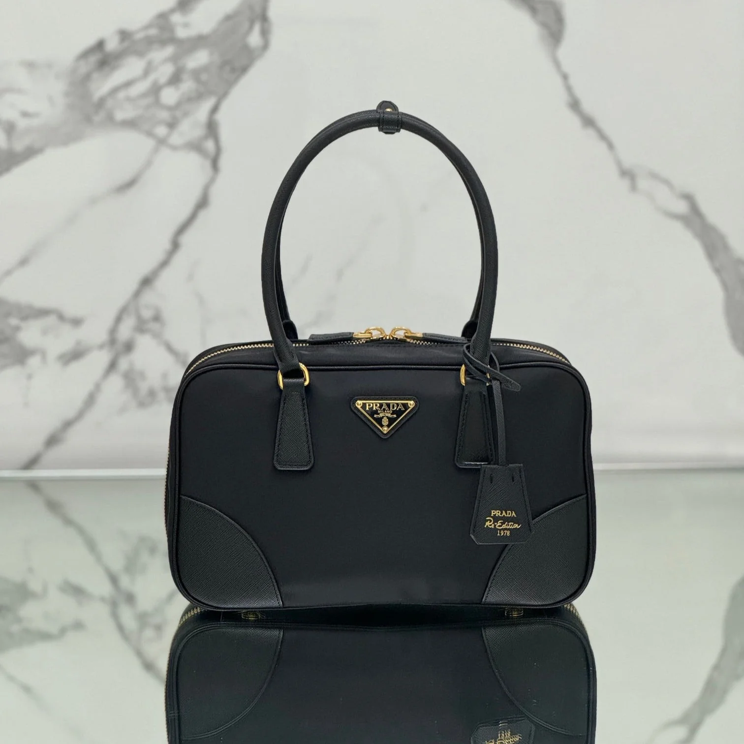 Prada MEDIUM TOP HANDLE BAG 30 IN BLACK NYLON AND CALFSKIN TRIM