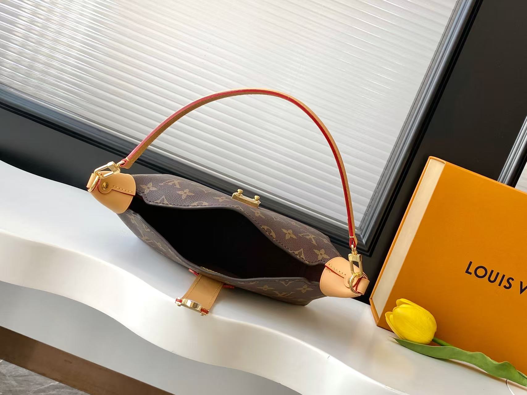 Louis Vuitton Pochette Mia Handbag