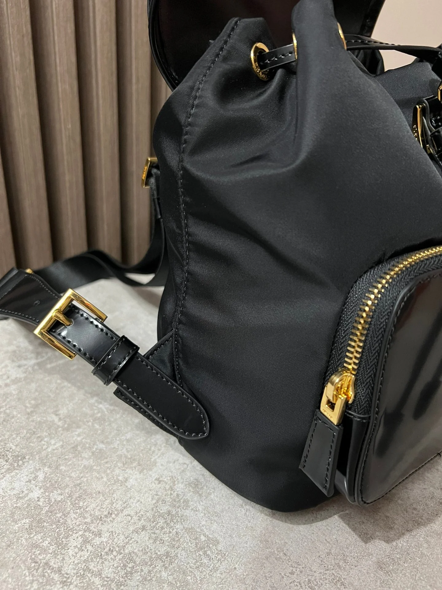 Prada BACKPACK 25 IN BLACK RE-NYLON AND GLOSSY CALFSKIN GOLD HARDWARE