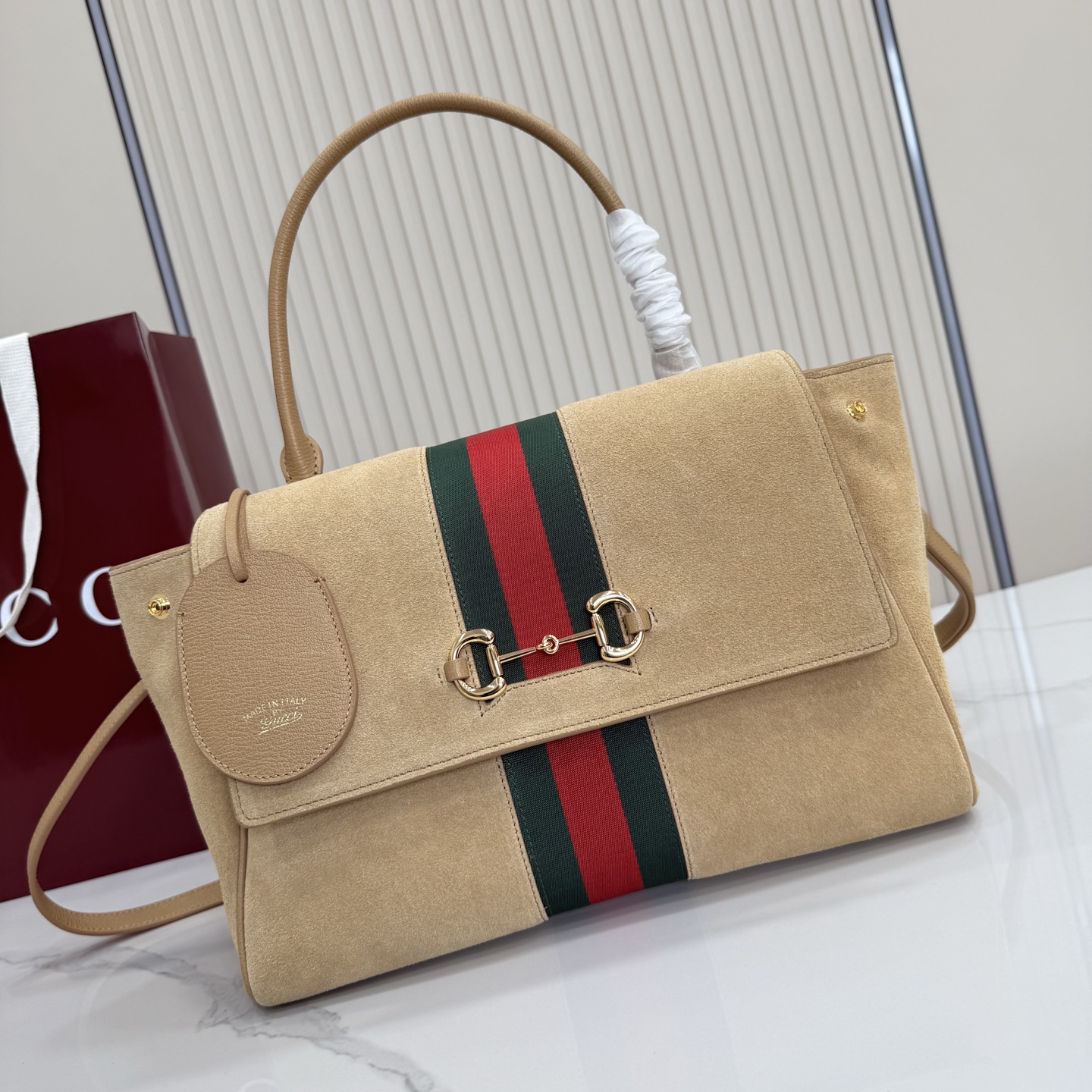 Gucci Paparazzo Medium top handle bag 875018