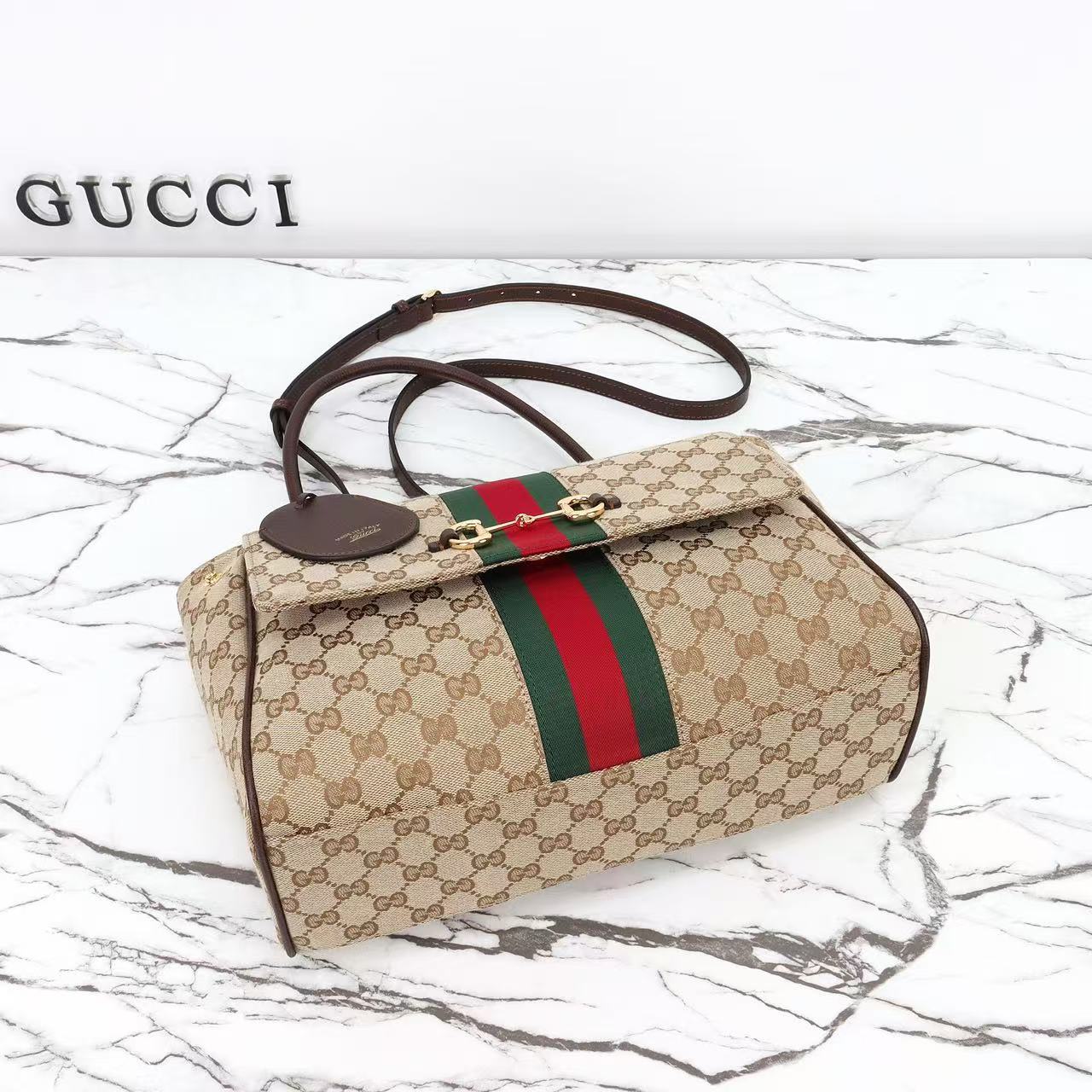 GUCCI Paparazzo medium top handle bag