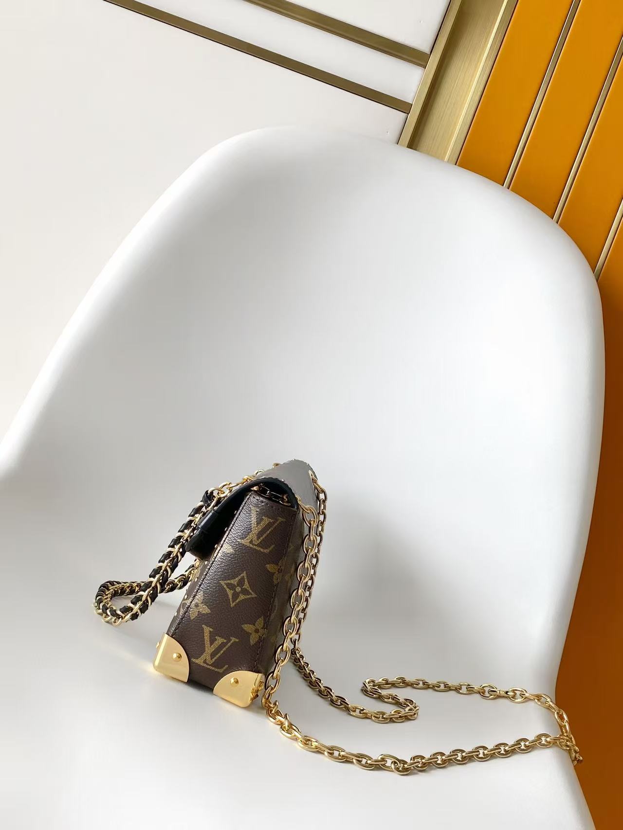 Louis Vuitton East West horizontal version Trunkie handbag
