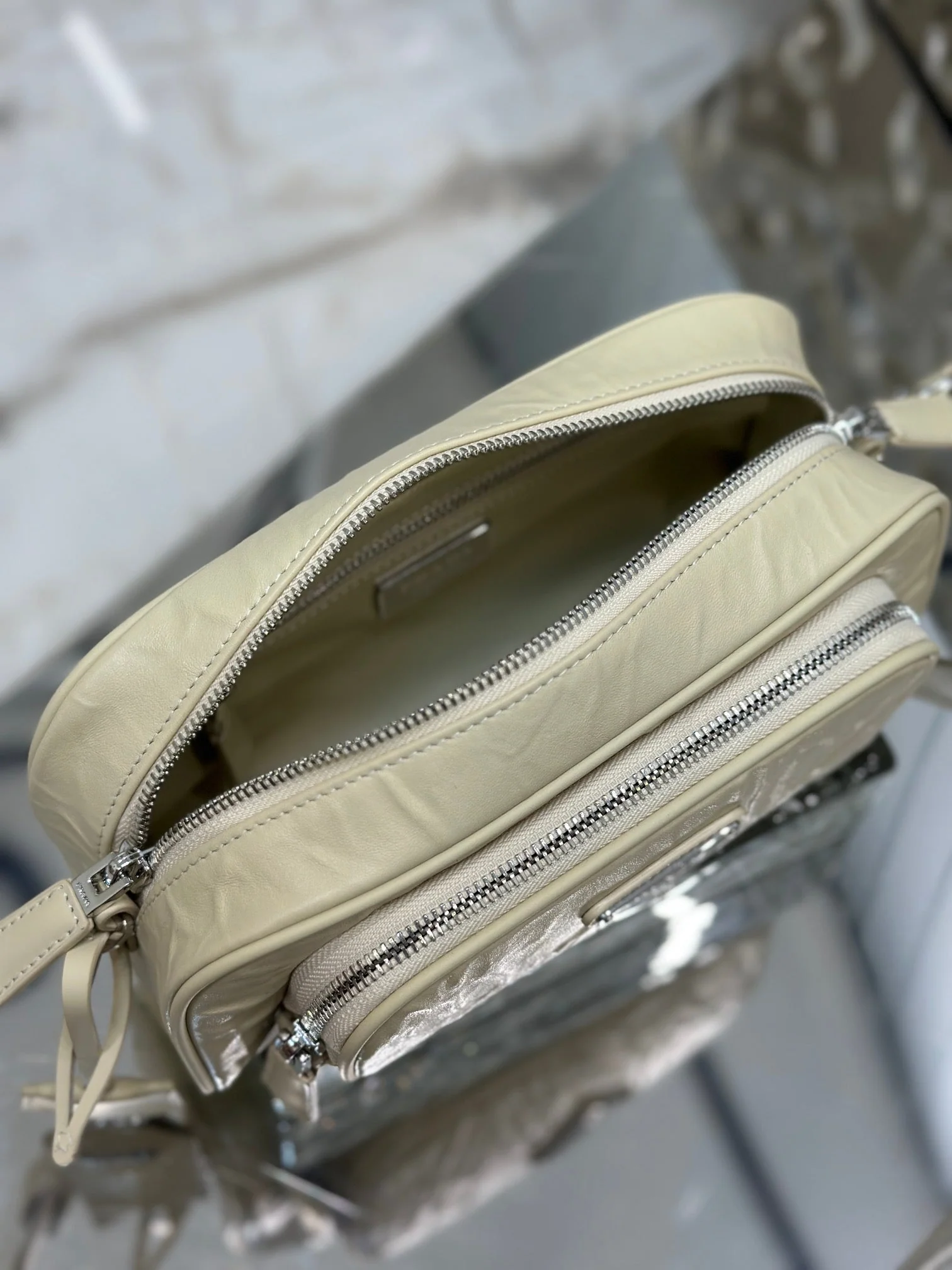 Prada CAMERA BAG 23 IN CREAM WRINKLED LAMBSKIN