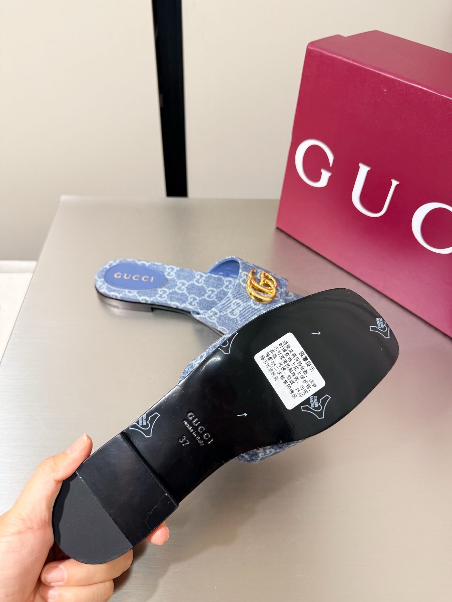 Women's Gucci Flat slide sandal with Double G
