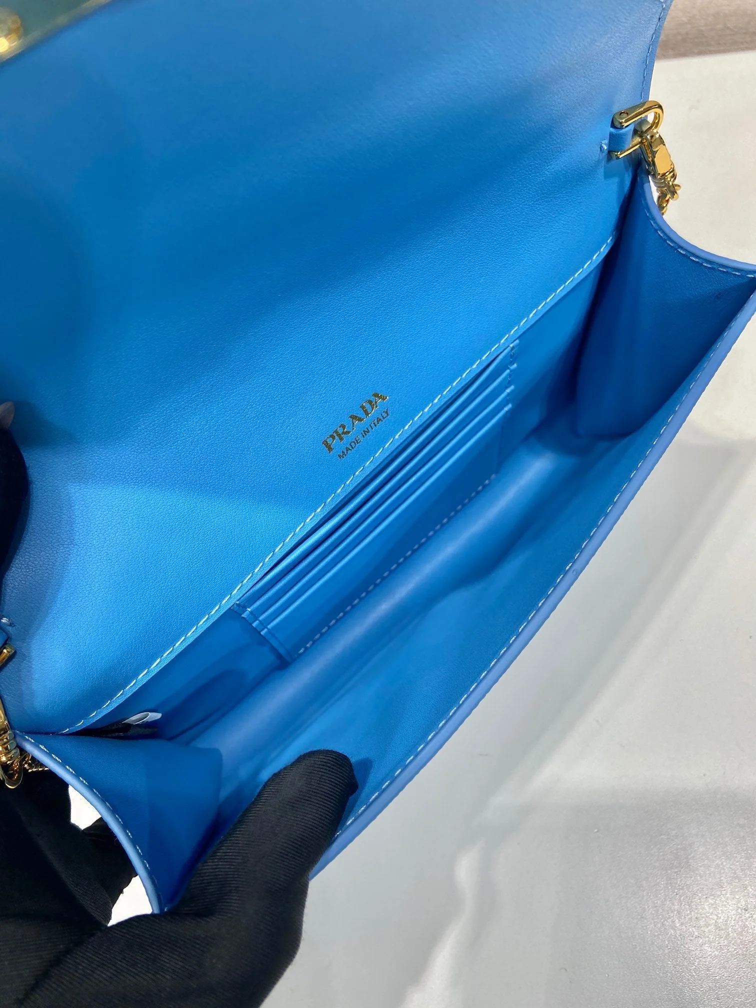 Prada PRA Cross pattern envelope bag blue leather 341158