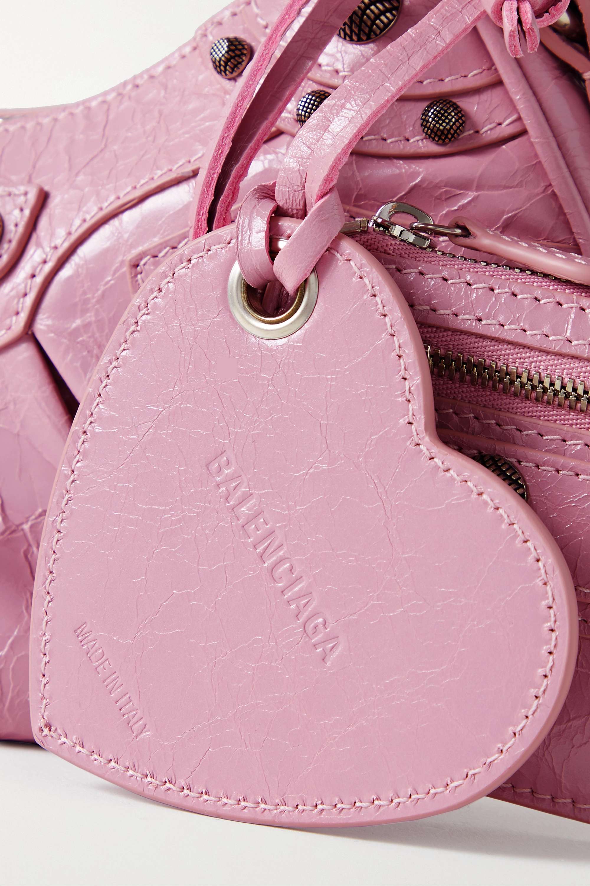 BALENCIAGA Le Cagole XS studded crinkled-leather shoulder bag pink