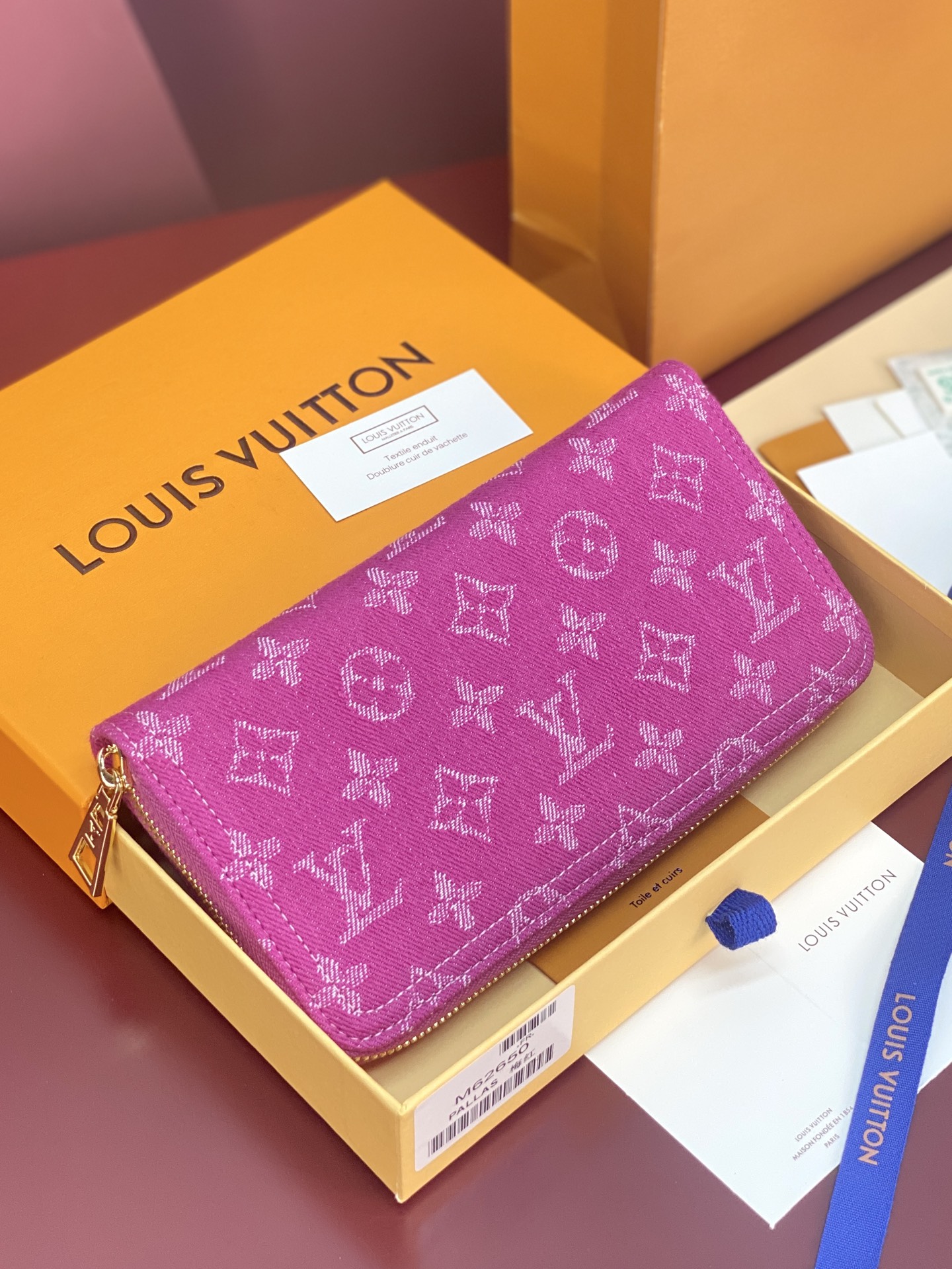 M28297 LV Zippy Wallet in Monogram Fuchsia Denim