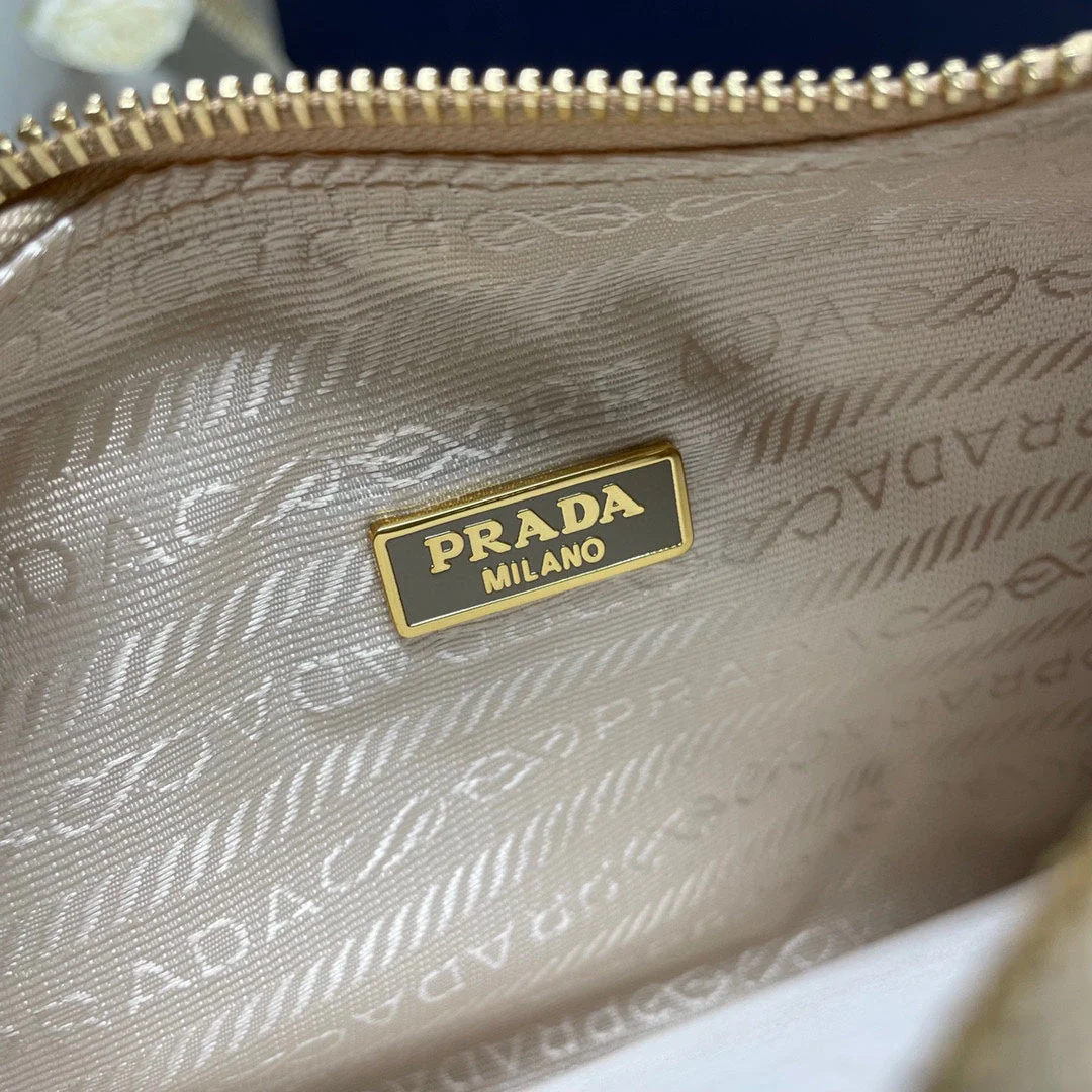 Prada  WOVEN HOBO BAG 23 IN BEIGE RAFFIA GOLD HARDWARE TRIANGLE LOGO