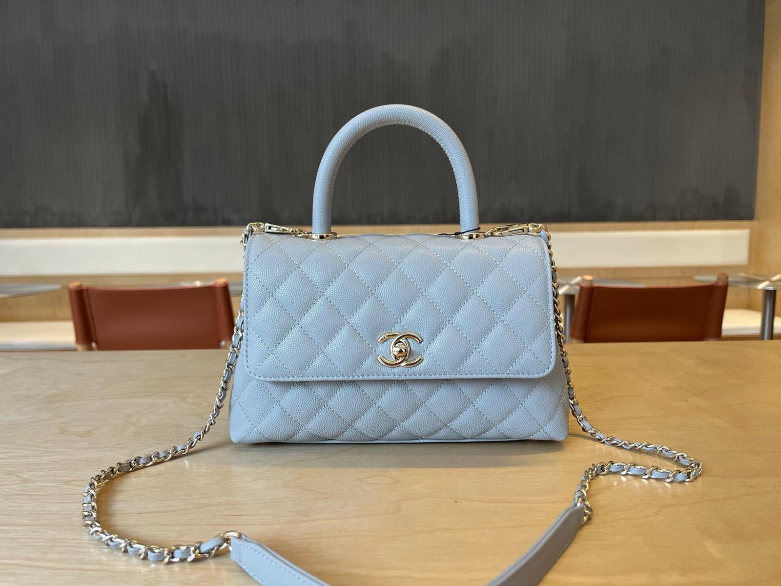 CHANEL hand-held flap bag